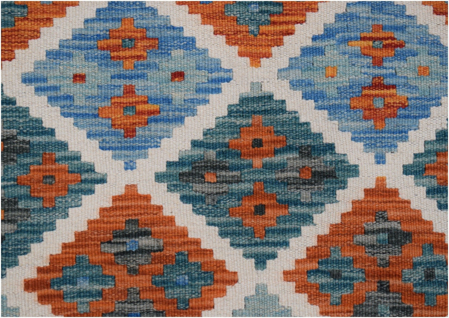 Handwoven Afghan Maimana kilim runner featuring a geometric diamond pattern in blue and orange.