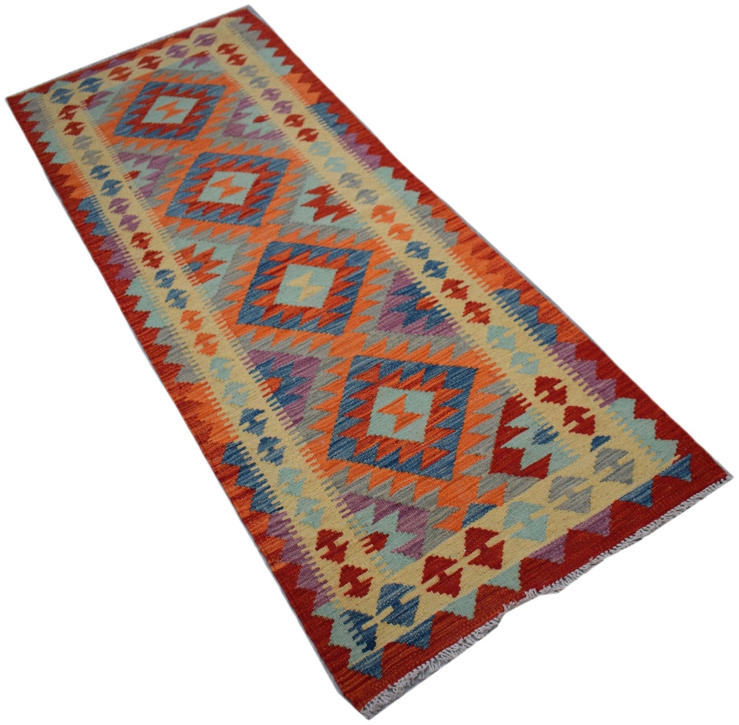 Handwoven Afghan Maimana wool runner rug featuring a geometric diamond pattern in vibrant colors.