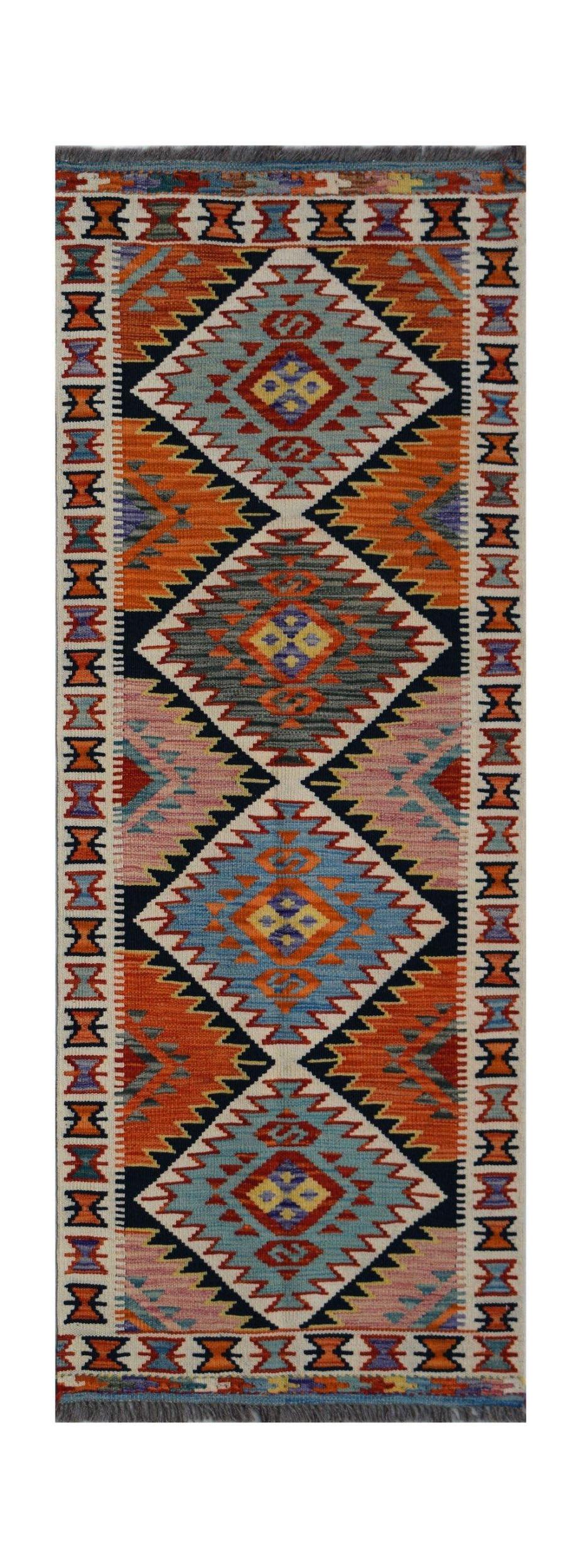 Handwoven Afghan Maimana wool runner rug featuring a vibrant geometric diamond pattern.