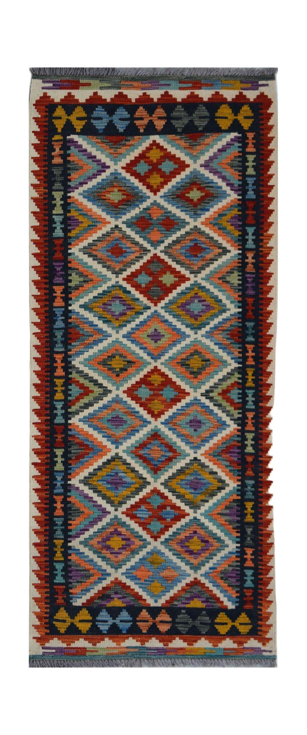 Handwoven Afghan Maimana wool runner featuring a colorful geometric diamond pattern.