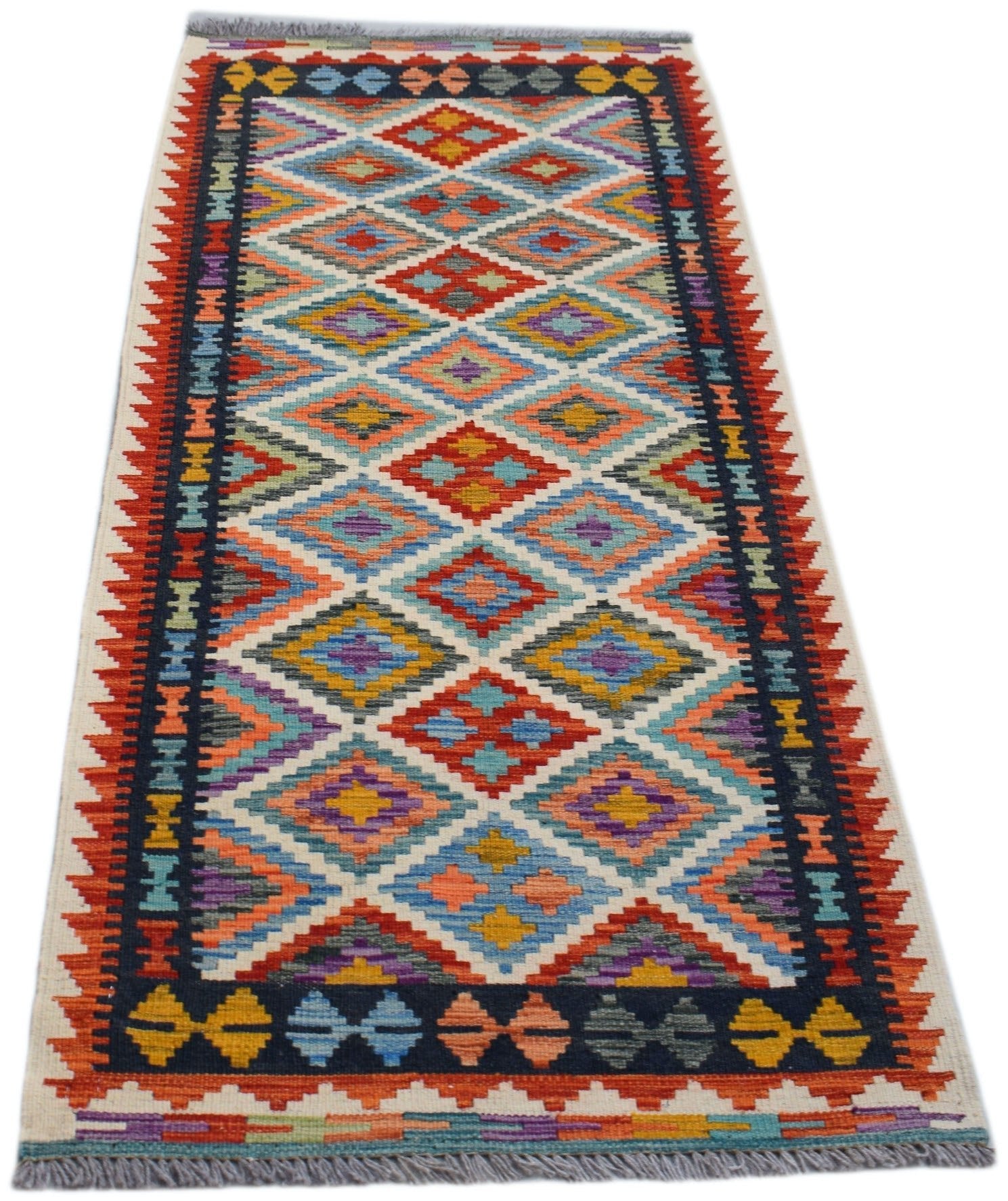 Handwoven Afghan Maimana wool runner rug featuring a colorful geometric diamond pattern.