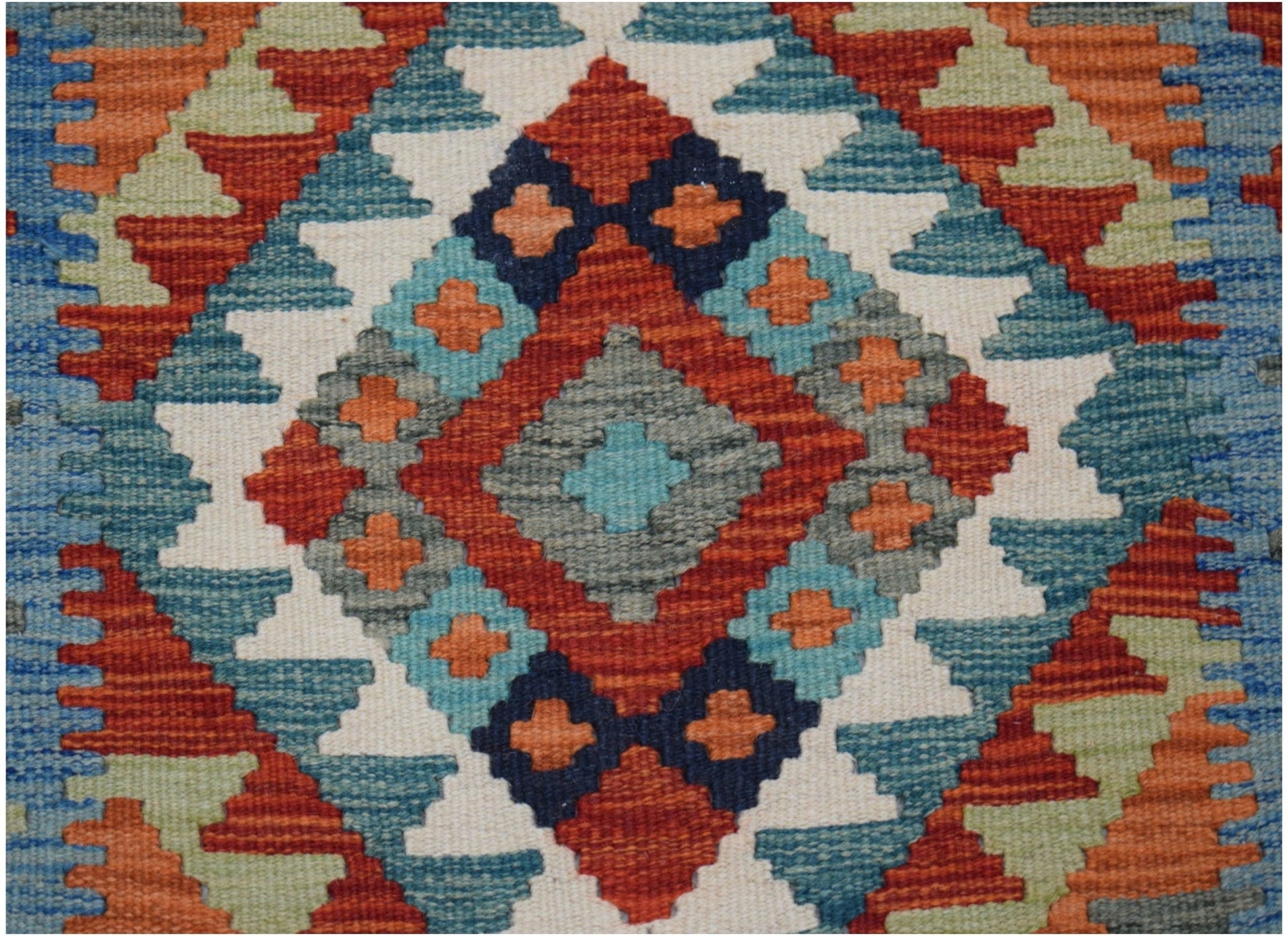 Handwoven Afghan Maimana wool runner featuring a geometric diamond pattern in vibrant colors.