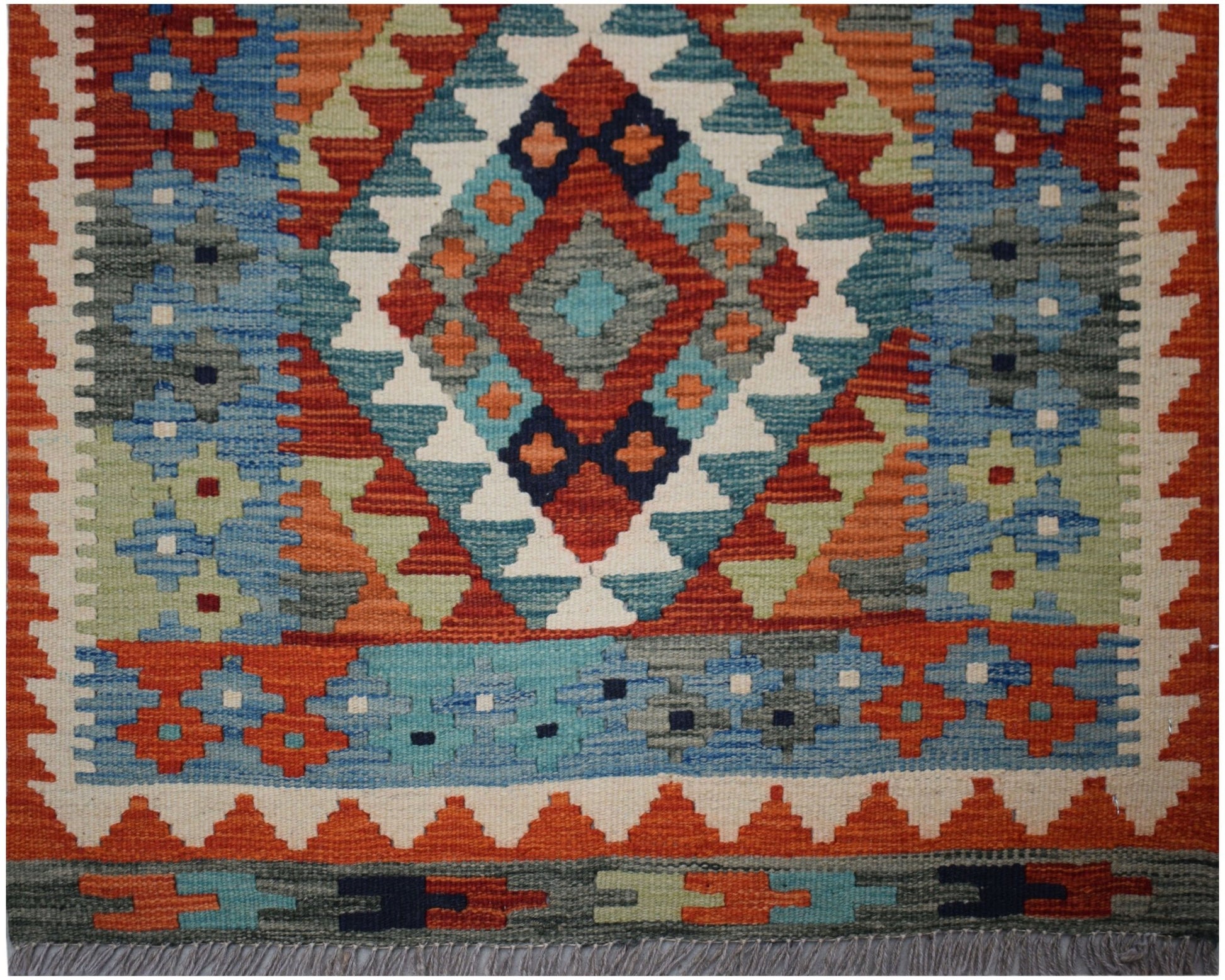 Handwoven Afghan Maimana wool kilim runner featuring a geometric diamond pattern in vibrant colors.