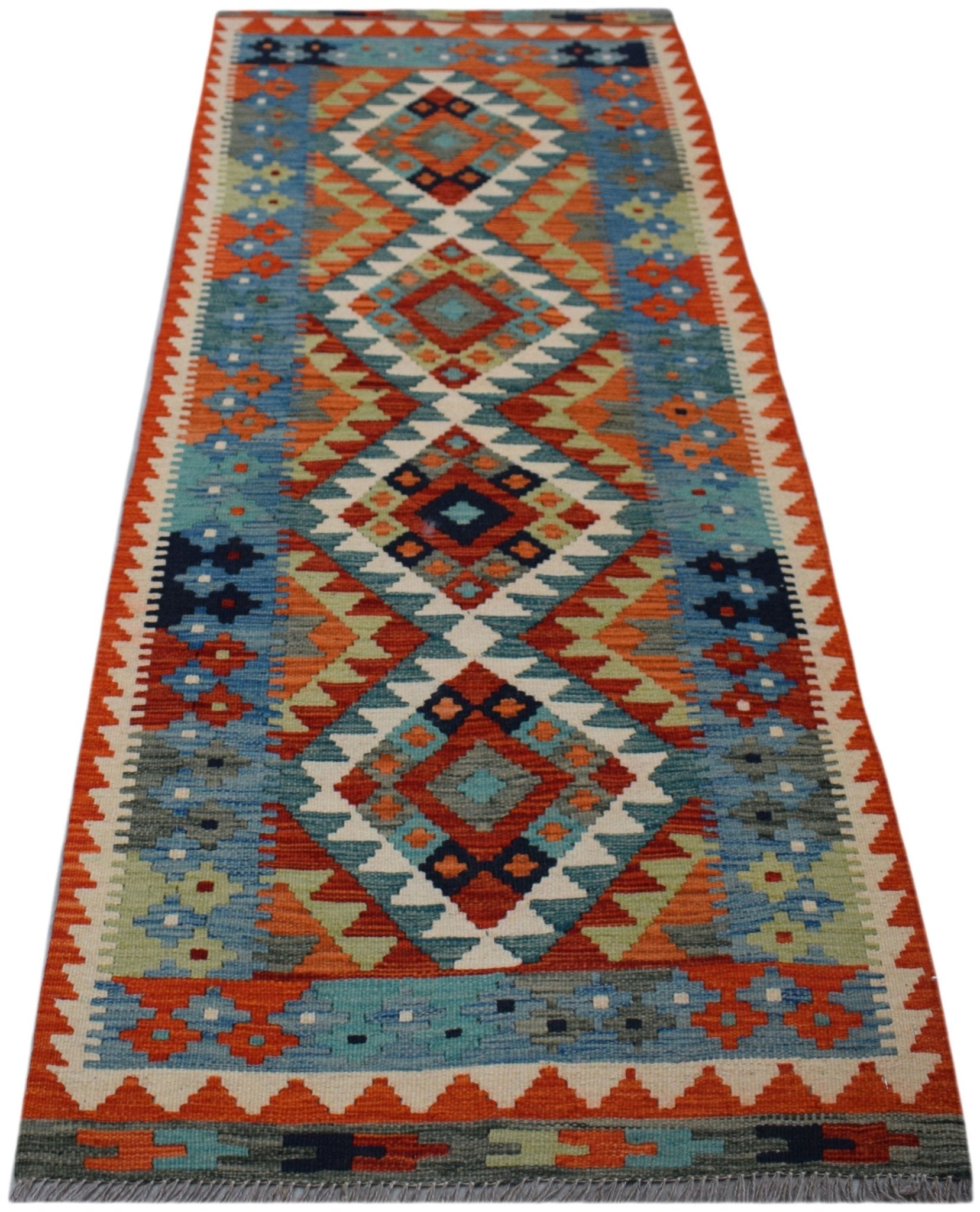 Handmade Afghan Maimana wool runner rug featuring a colorful geometric diamond pattern.