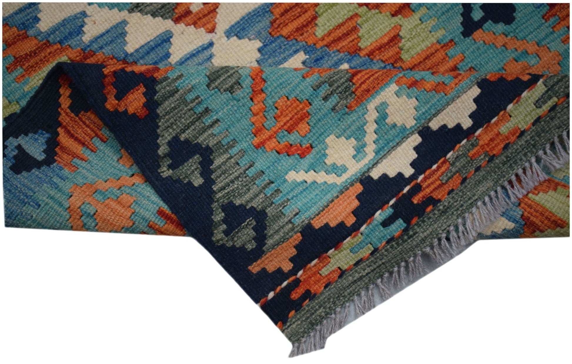 A handmade Afghan Maimana wool kilim runner featuring a geometric pattern in blue and orange.