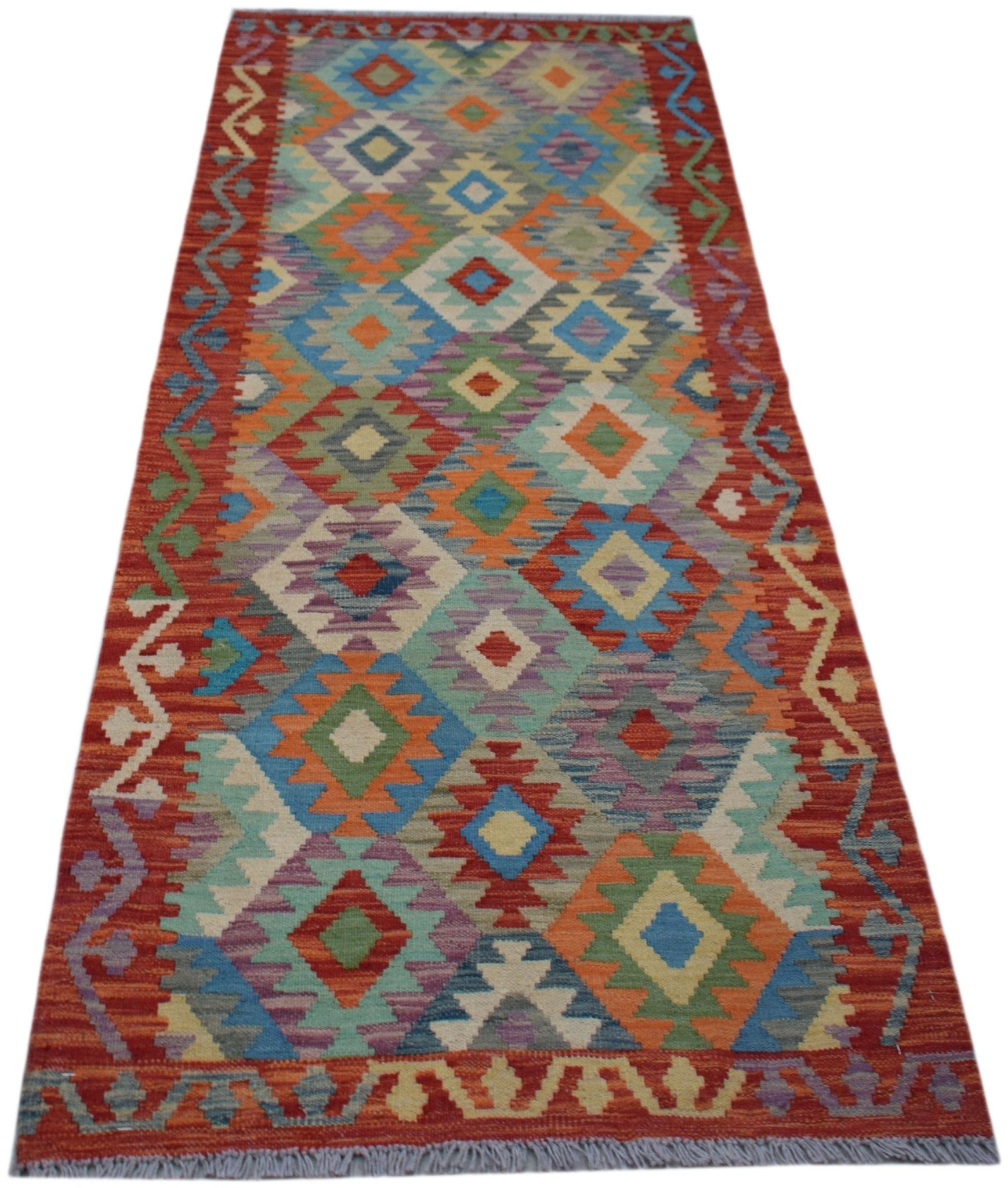Handwoven Afghan Maimana wool runner rug featuring a colorful geometric diamond pattern.