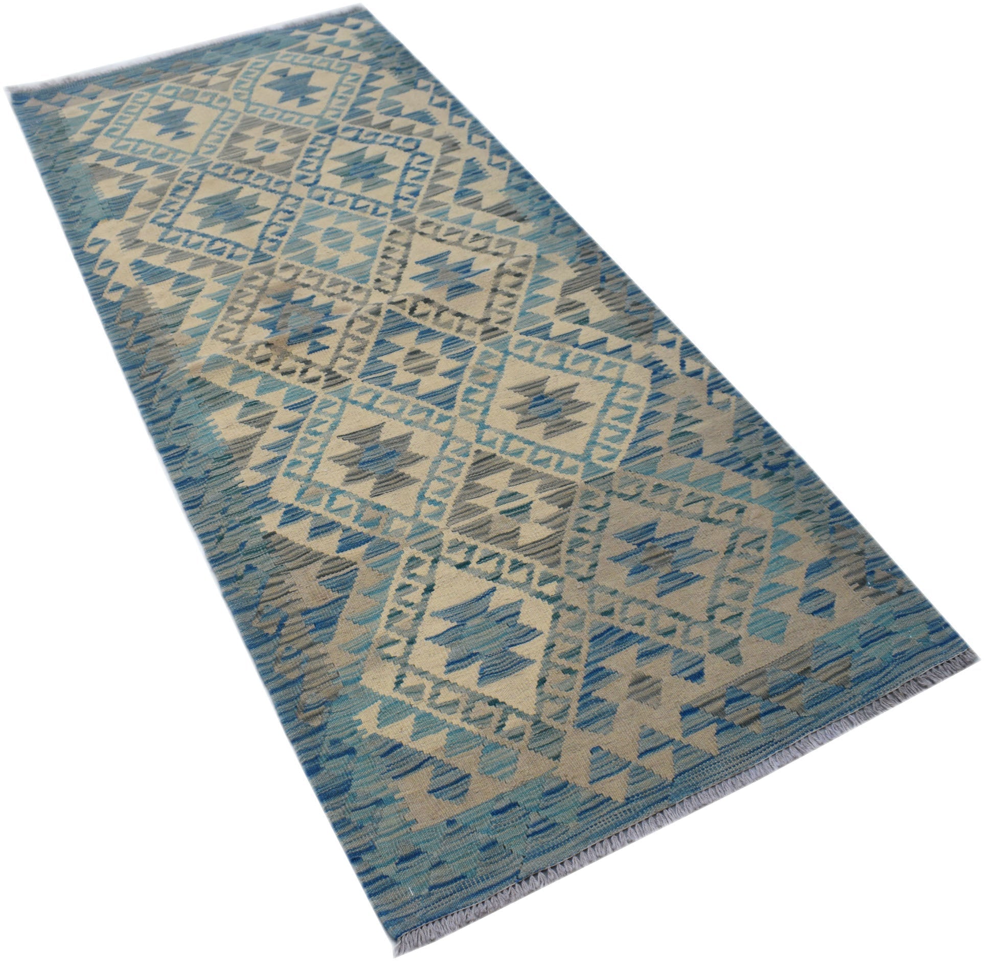 An Afghan Maimana Kilim runner featuring a geometric diamond pattern in shades of blue and beige.