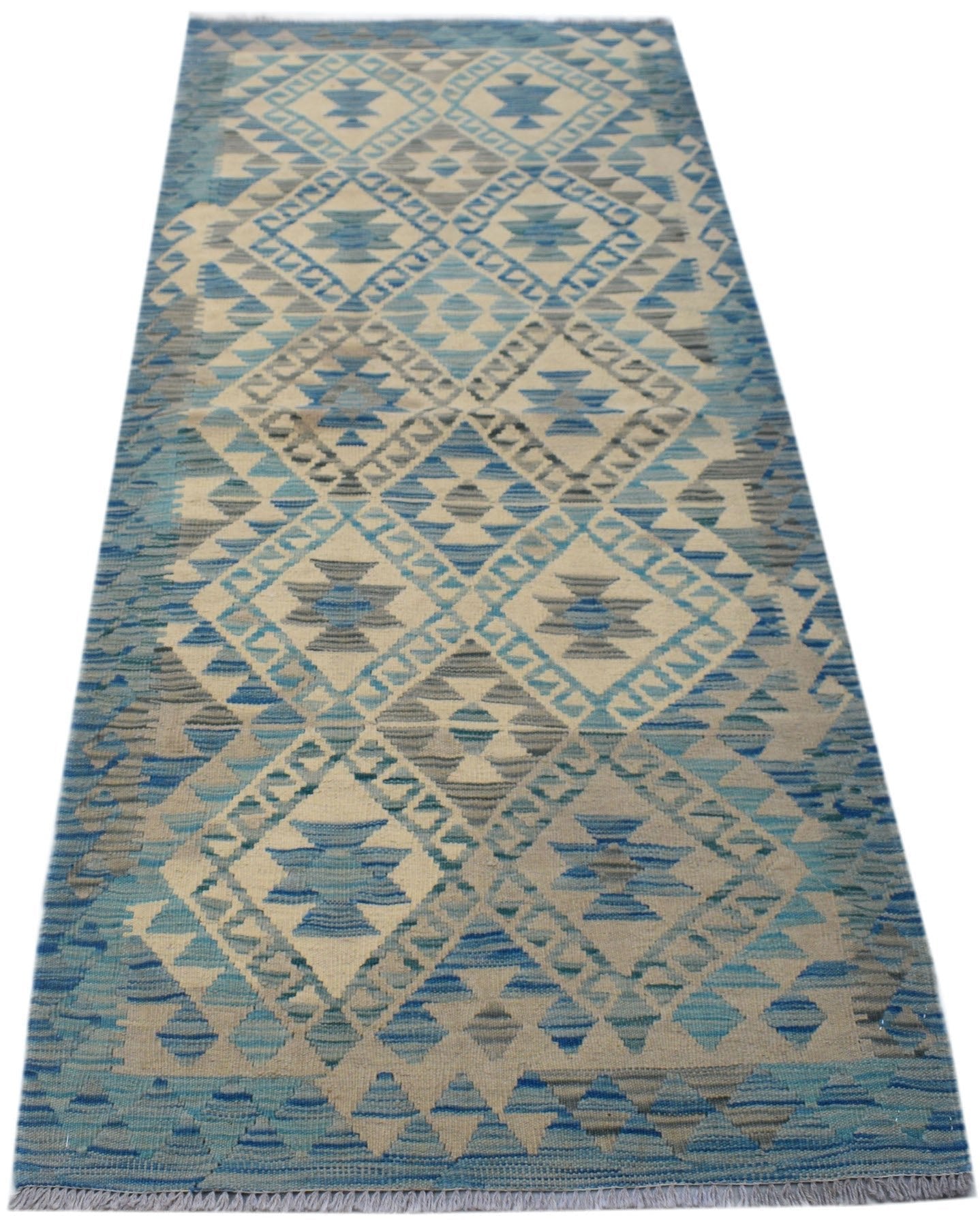 Handwoven Afghan Maimana wool runner rug featuring a blue and beige geometric diamond pattern.