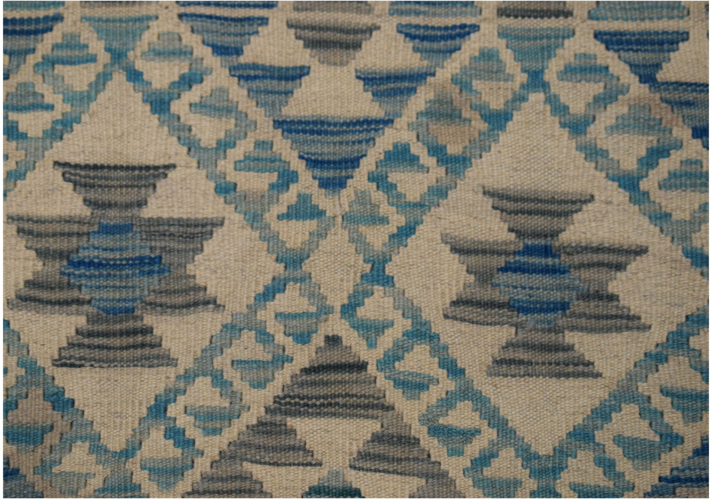 Handwoven Afghan Maimana wool kilim runner featuring a geometric diamond pattern in blue and grey.