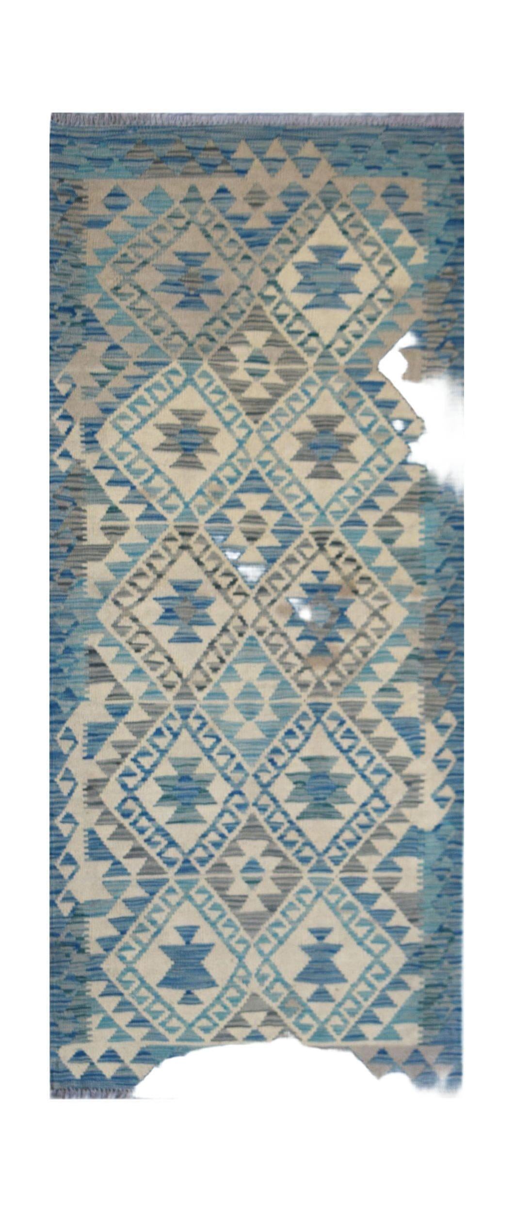 Handwoven Afghan Maimana wool runner featuring a blue and cream geometric diamond pattern.