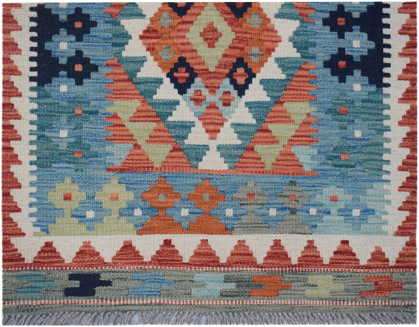 Handwoven Afghan Maimana kilim runner featuring a geometric pattern in blue, orange, and green.