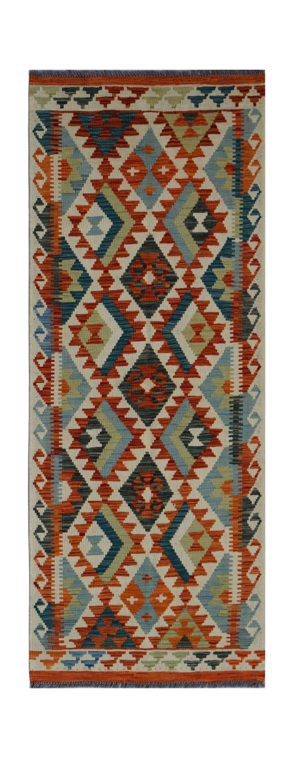 Handwoven Afghan Maimana wool runner featuring a colorful geometric diamond pattern.