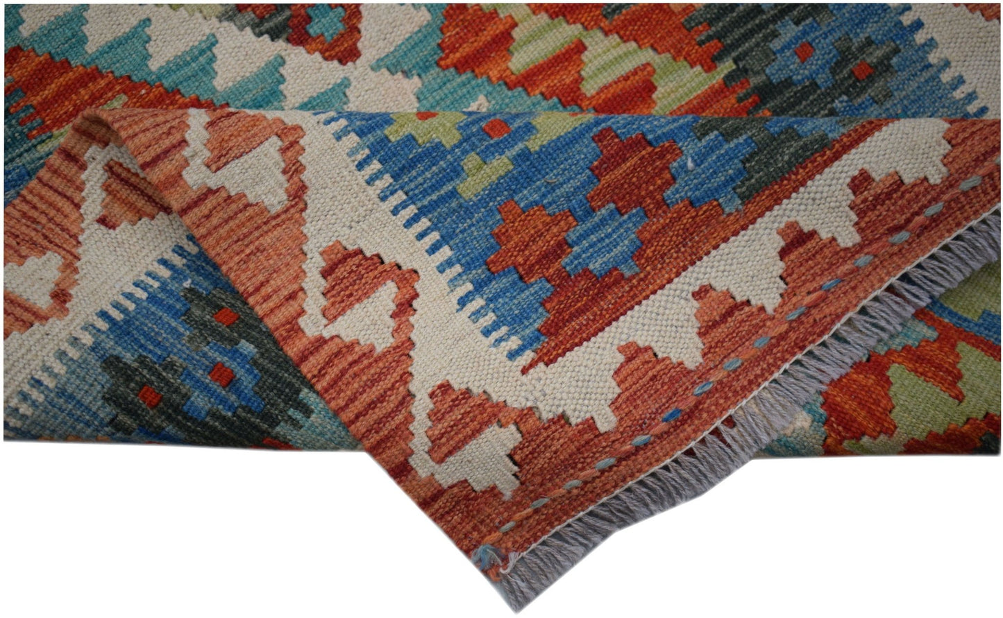 A handwoven Afghan Maimana kilim runner featuring a geometric pattern in vibrant wool colors.