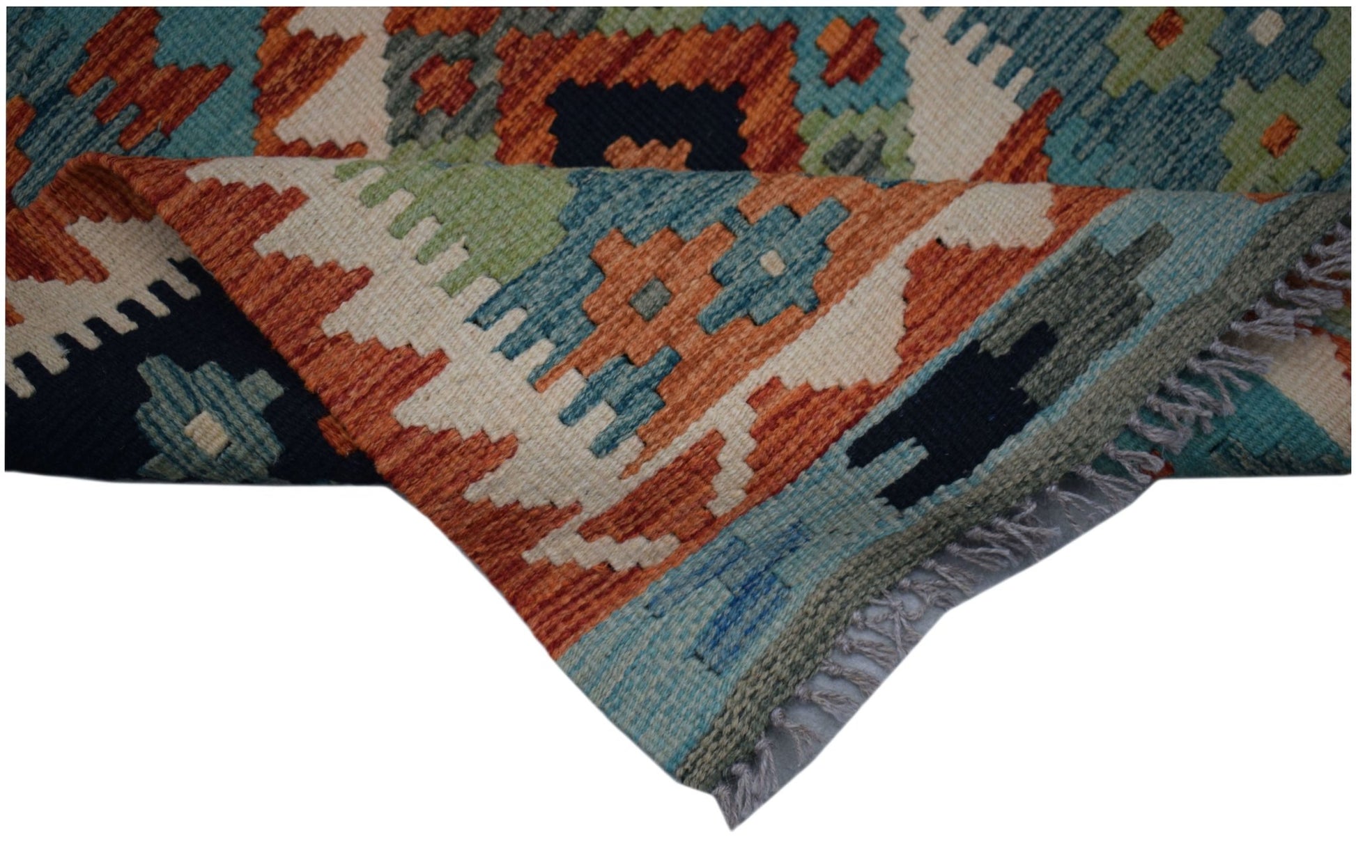 Handwoven Afghan Maimana wool runner featuring a geometric pattern in vibrant multi-colored tones.