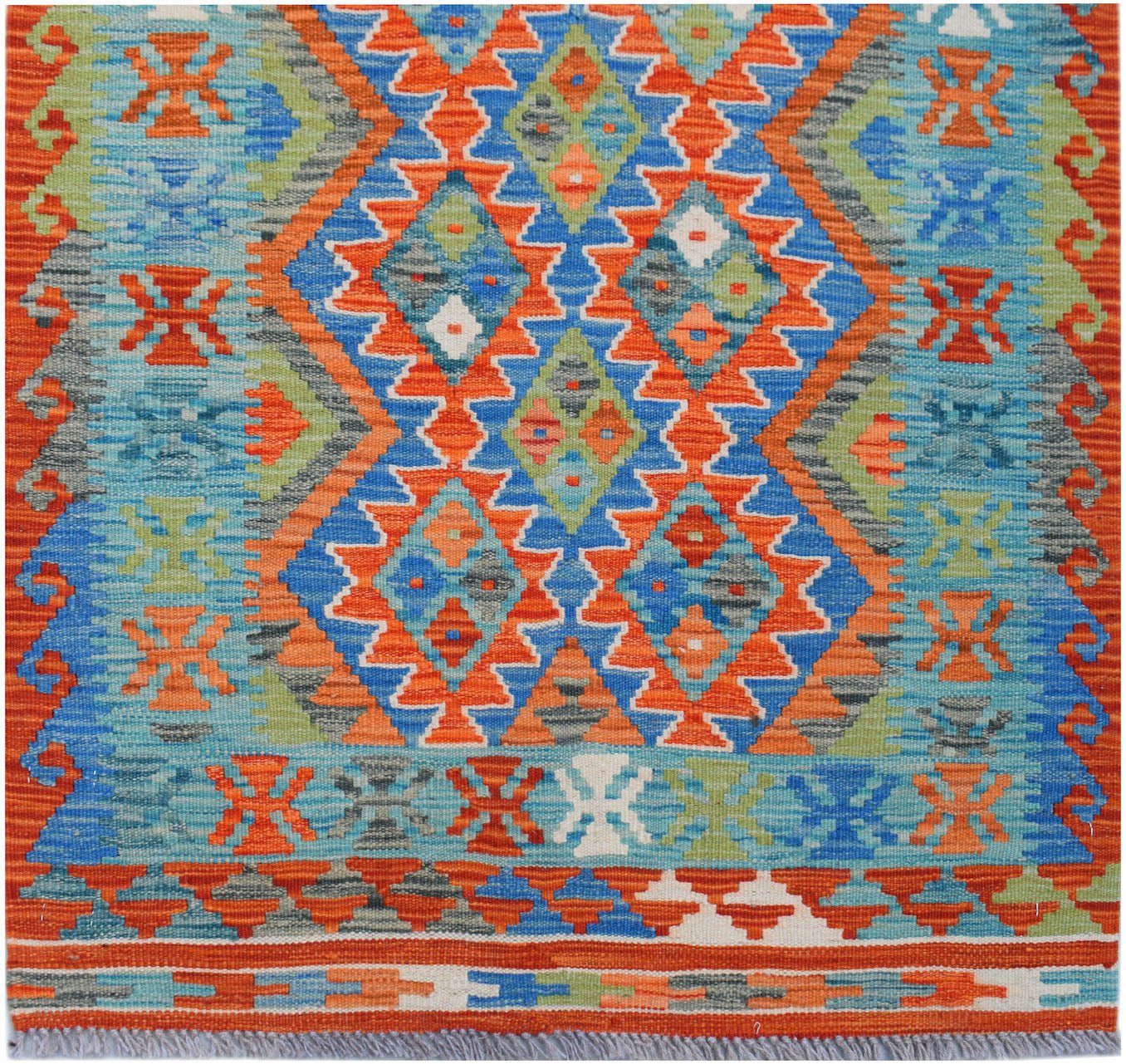 Handwoven Afghan Maimana wool runner featuring a vibrant geometric pattern in blue and orange.