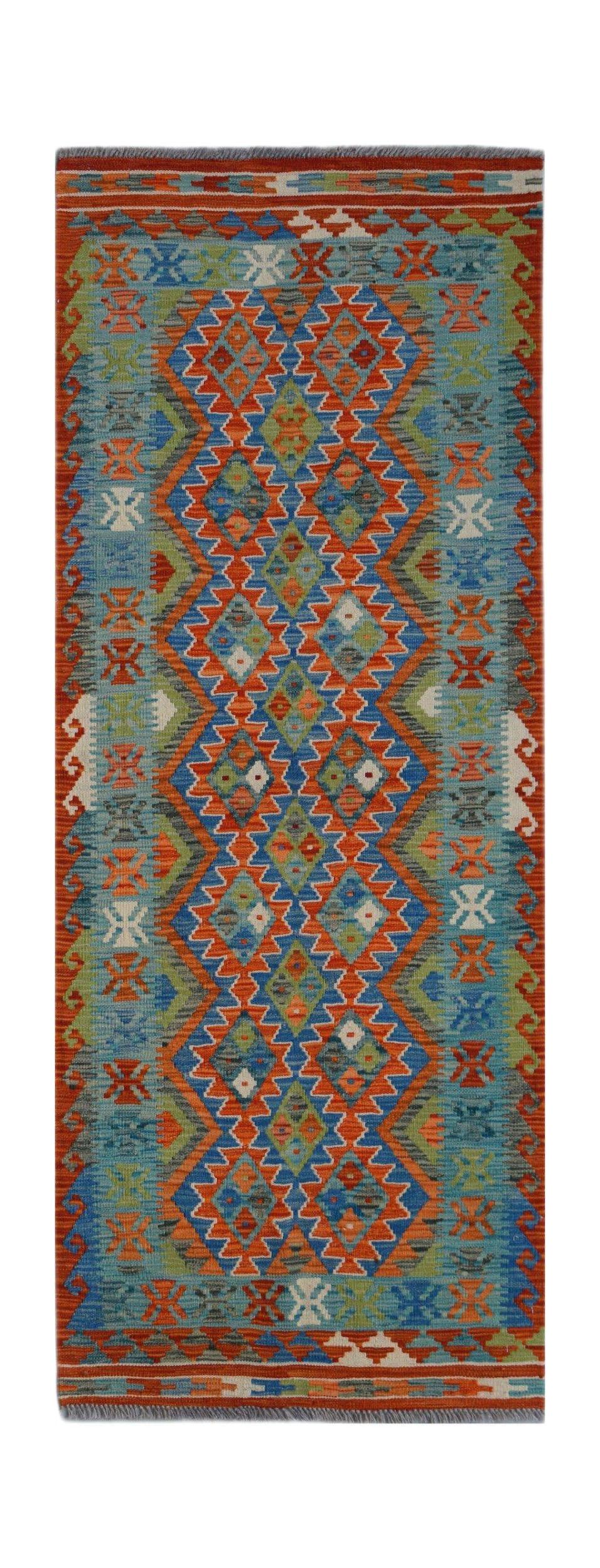 Handwoven Afghan Maimana wool runner rug featuring a vibrant geometric diamond pattern.