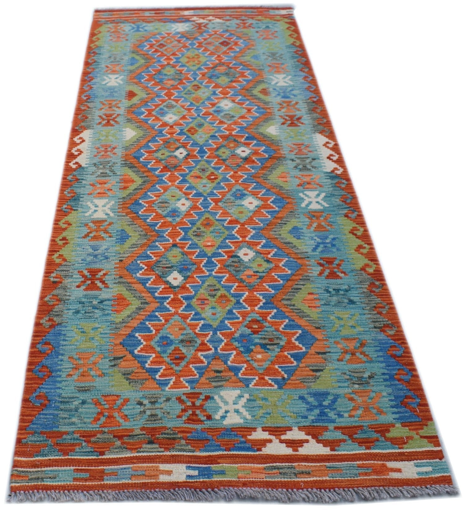 Handwoven Afghan Maimana wool runner rug featuring a vibrant geometric diamond pattern.