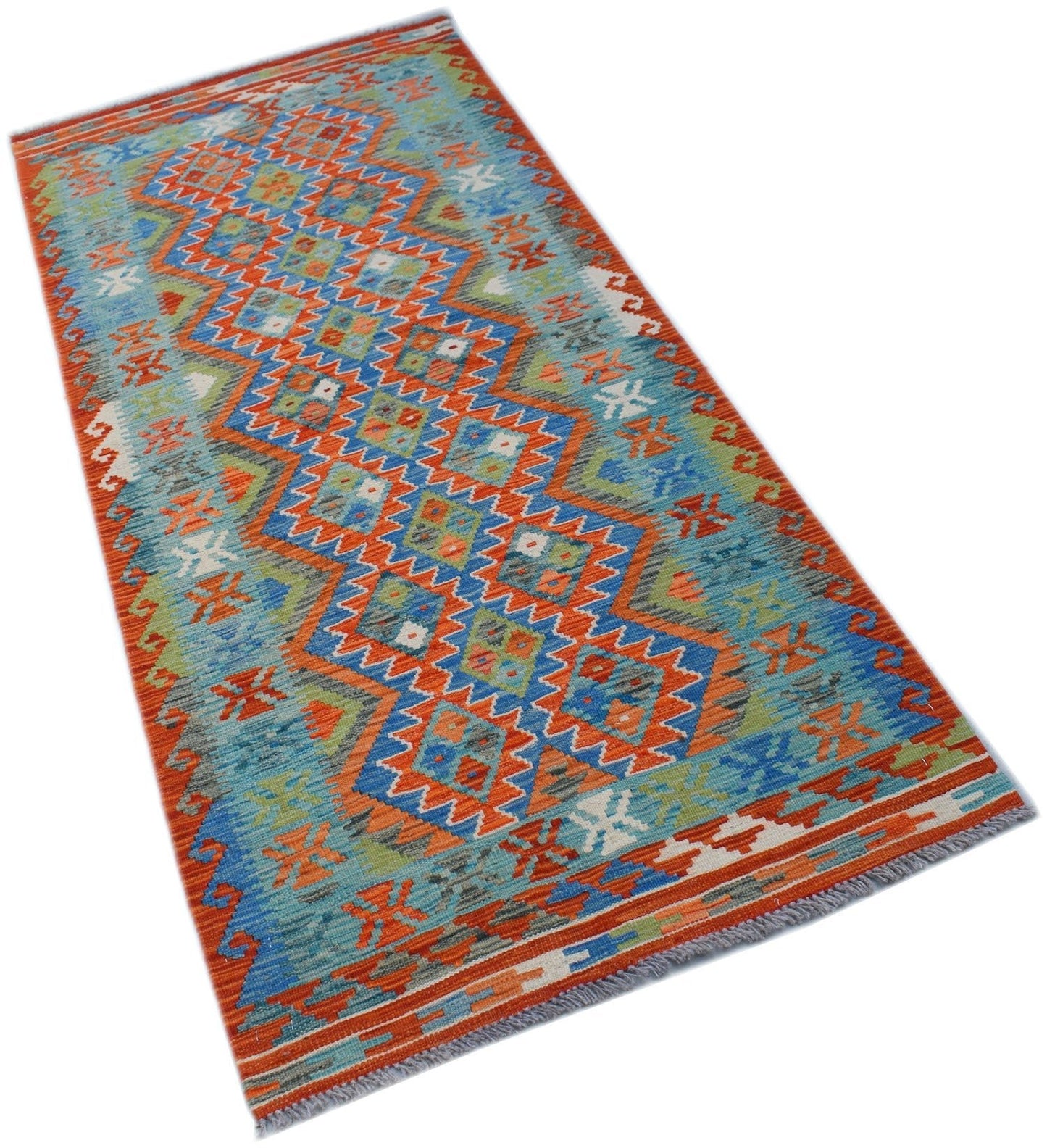 A handmade Afghan Maimana Kilim runner featuring a vibrant geometric pattern in blue and orange.