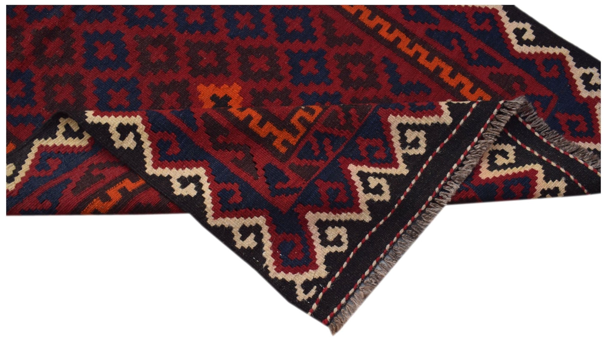 A handmade Afghan Maimana kilim runner featuring a geometric pattern in red, blue, and cream.