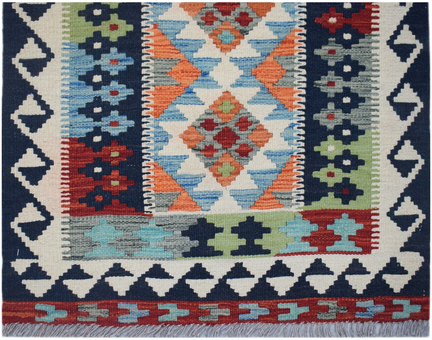 Handwoven Afghan Maimana wool kilim runner featuring a colorful geometric pattern.