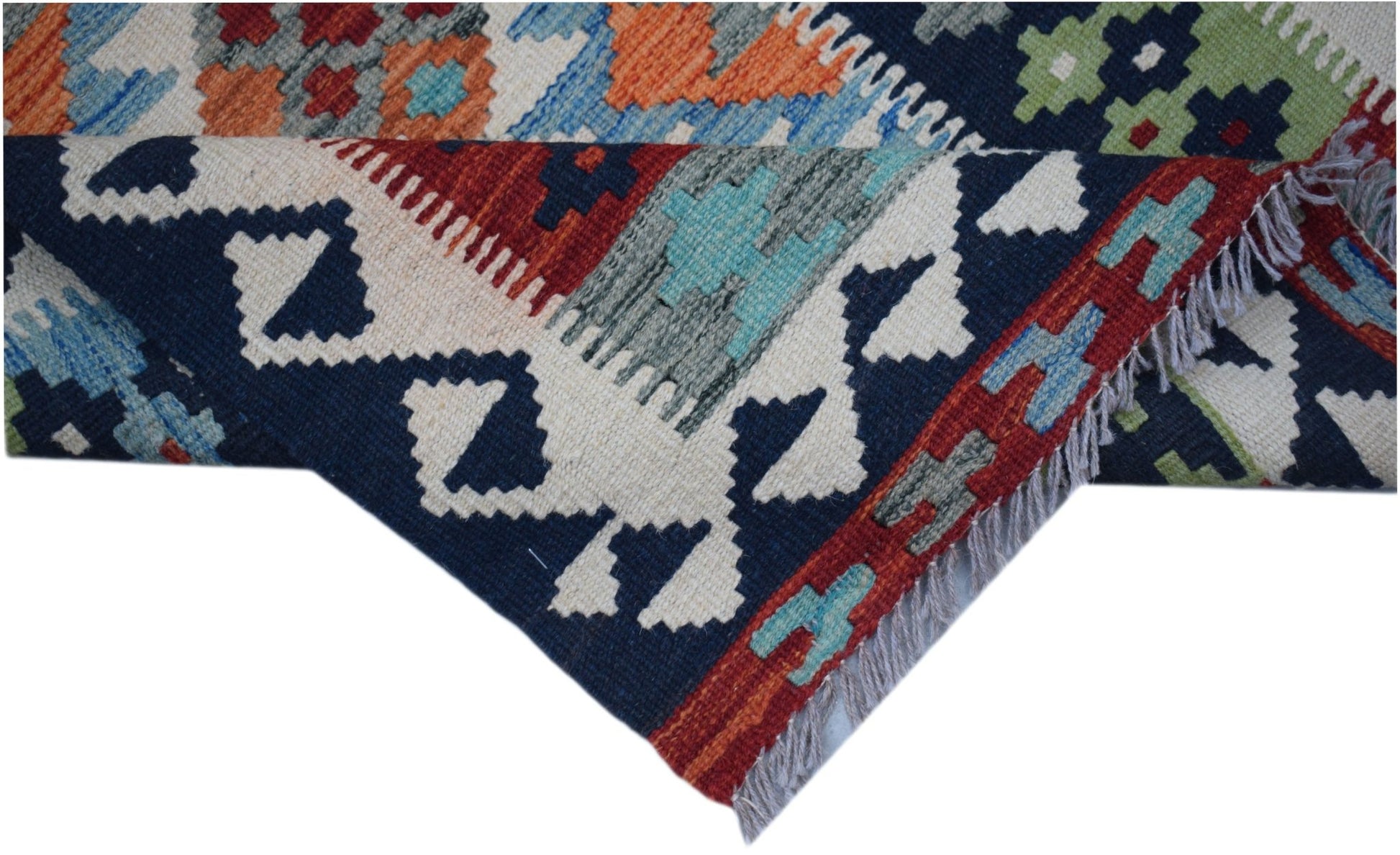 Handwoven Afghan Maimana kilim runner featuring a geometric pattern in vibrant wool colors.