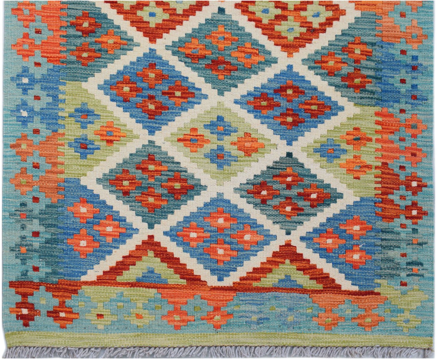 Handwoven Afghan Maimana wool runner featuring a colorful geometric diamond pattern.