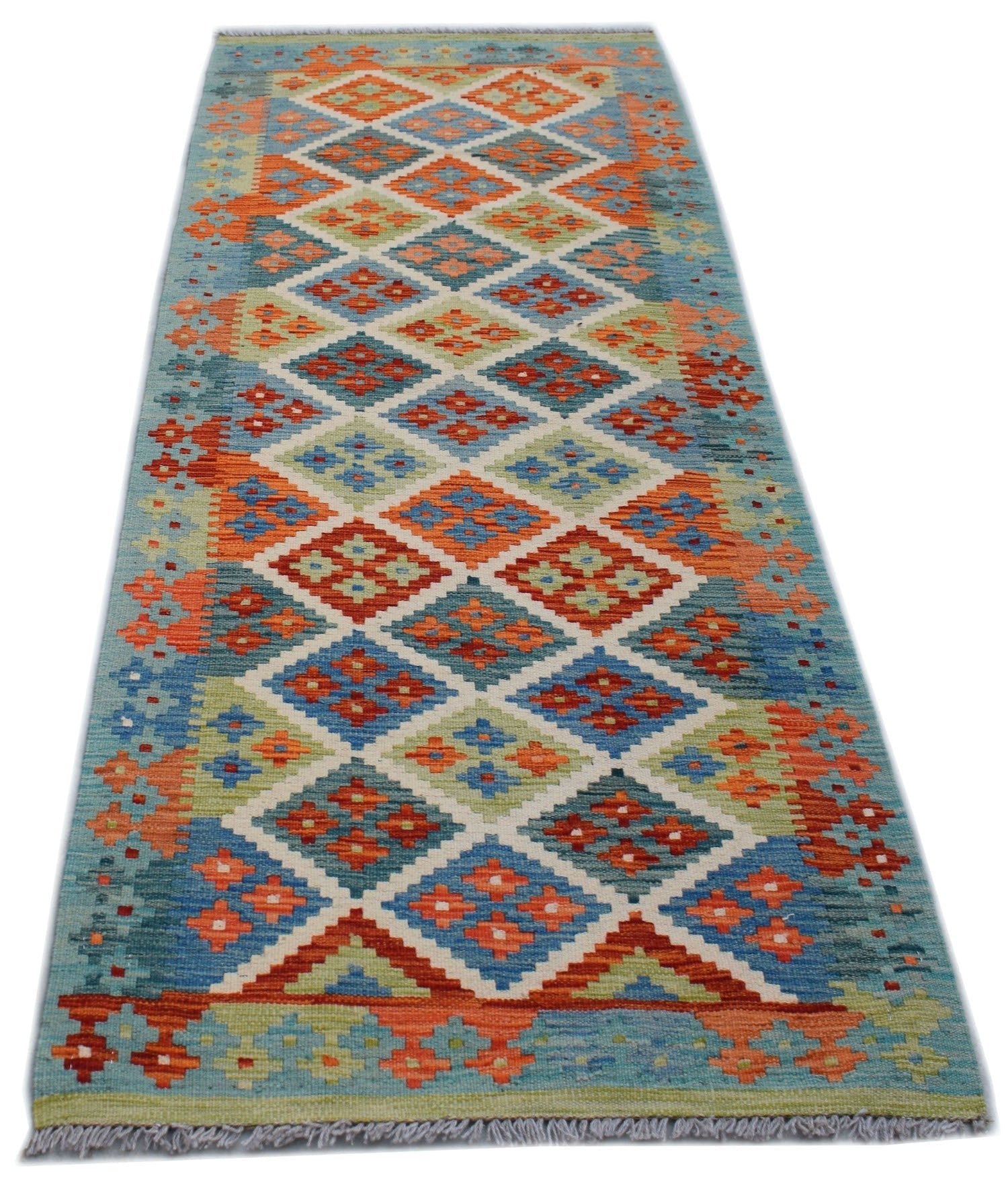Handwoven Afghan Maimana wool runner rug featuring a colorful geometric diamond pattern.