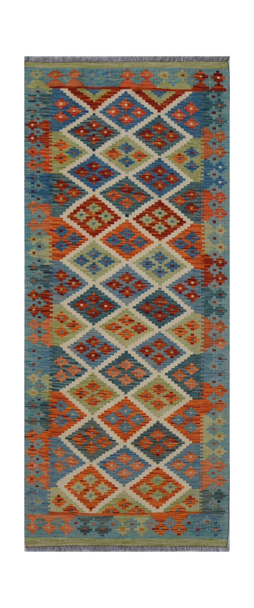 Handwoven Afghan Maimana wool runner rug featuring a colorful geometric diamond pattern.