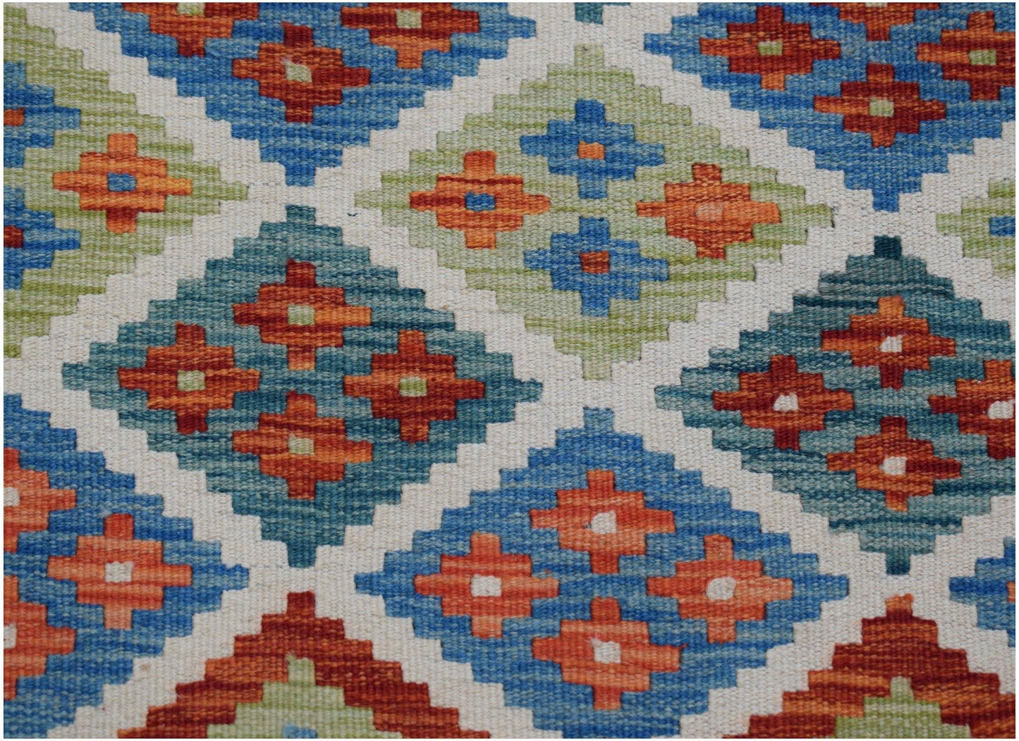 Handwoven Afghan Maimana kilim runner featuring a geometric diamond pattern in blue, orange, and green.