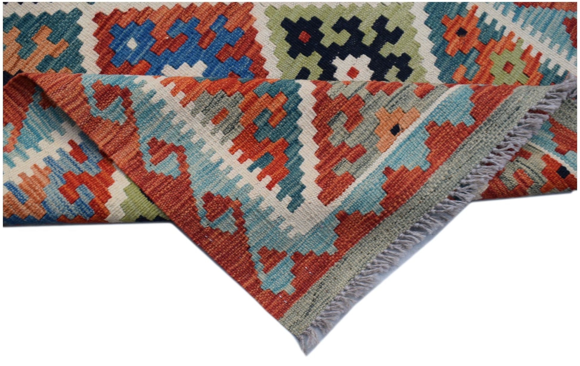 Handwoven Afghan Maimana wool kilim runner featuring a geometric pattern in vibrant colors.