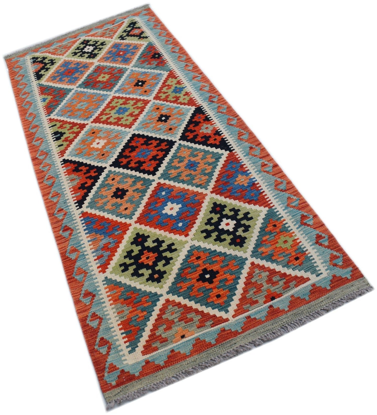 Handwoven Afghan Maimana wool runner rug featuring a colorful geometric diamond pattern.