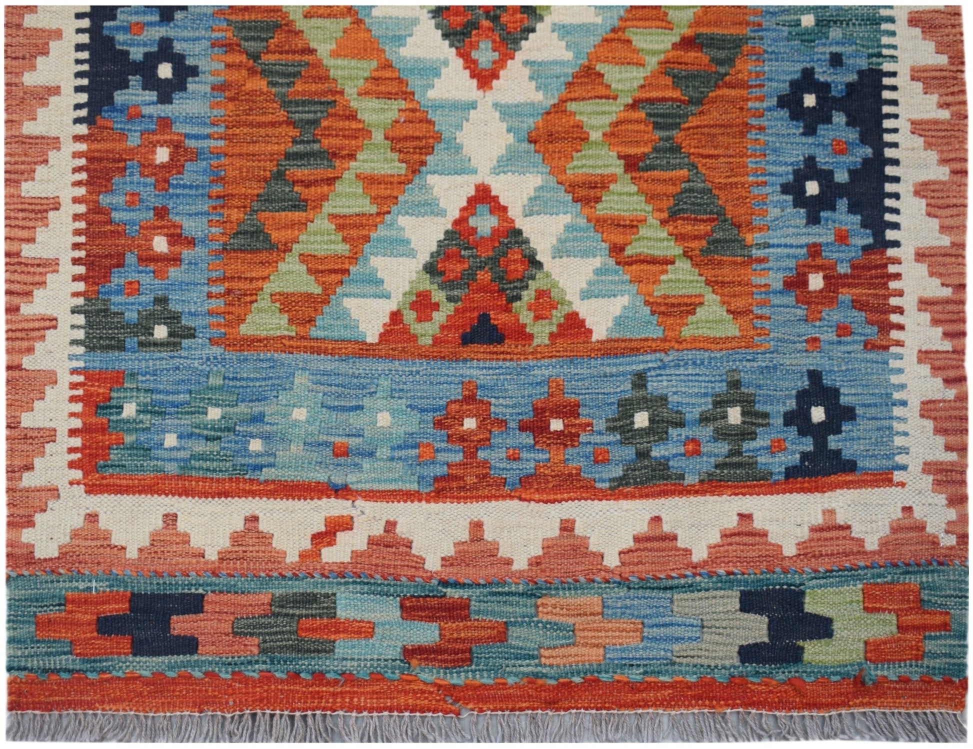 Handwoven Afghan Maimana wool runner featuring a vibrant geometric pattern in a flatweave style.