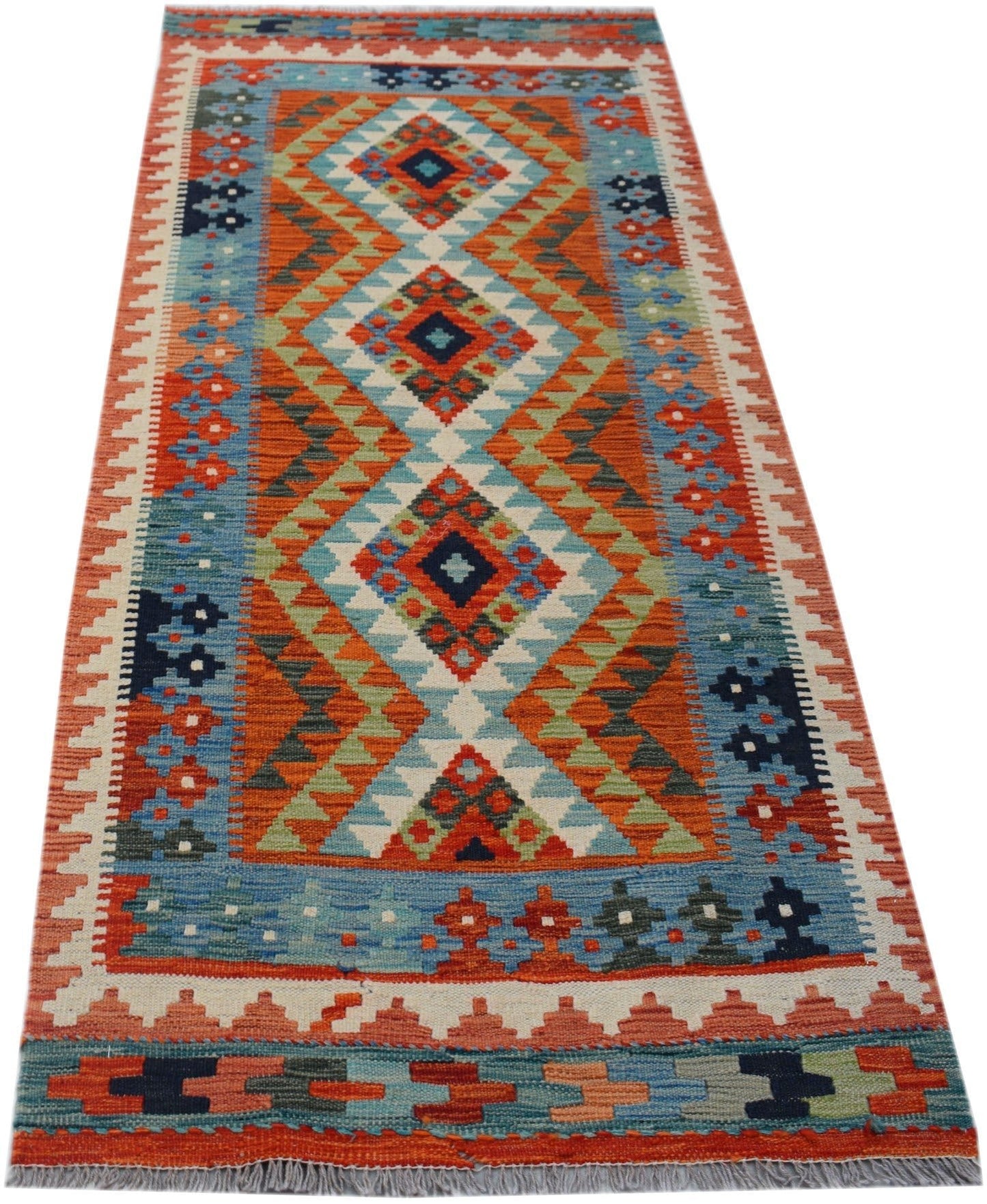 Handwoven Afghan Maimana wool runner rug featuring a colorful geometric diamond pattern.