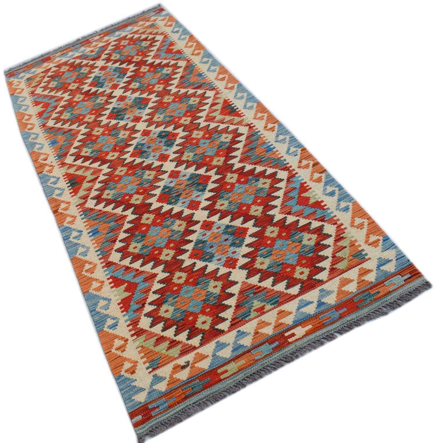 Handwoven Afghan Maimana wool runner rug featuring a geometric diamond pattern in red and blue.