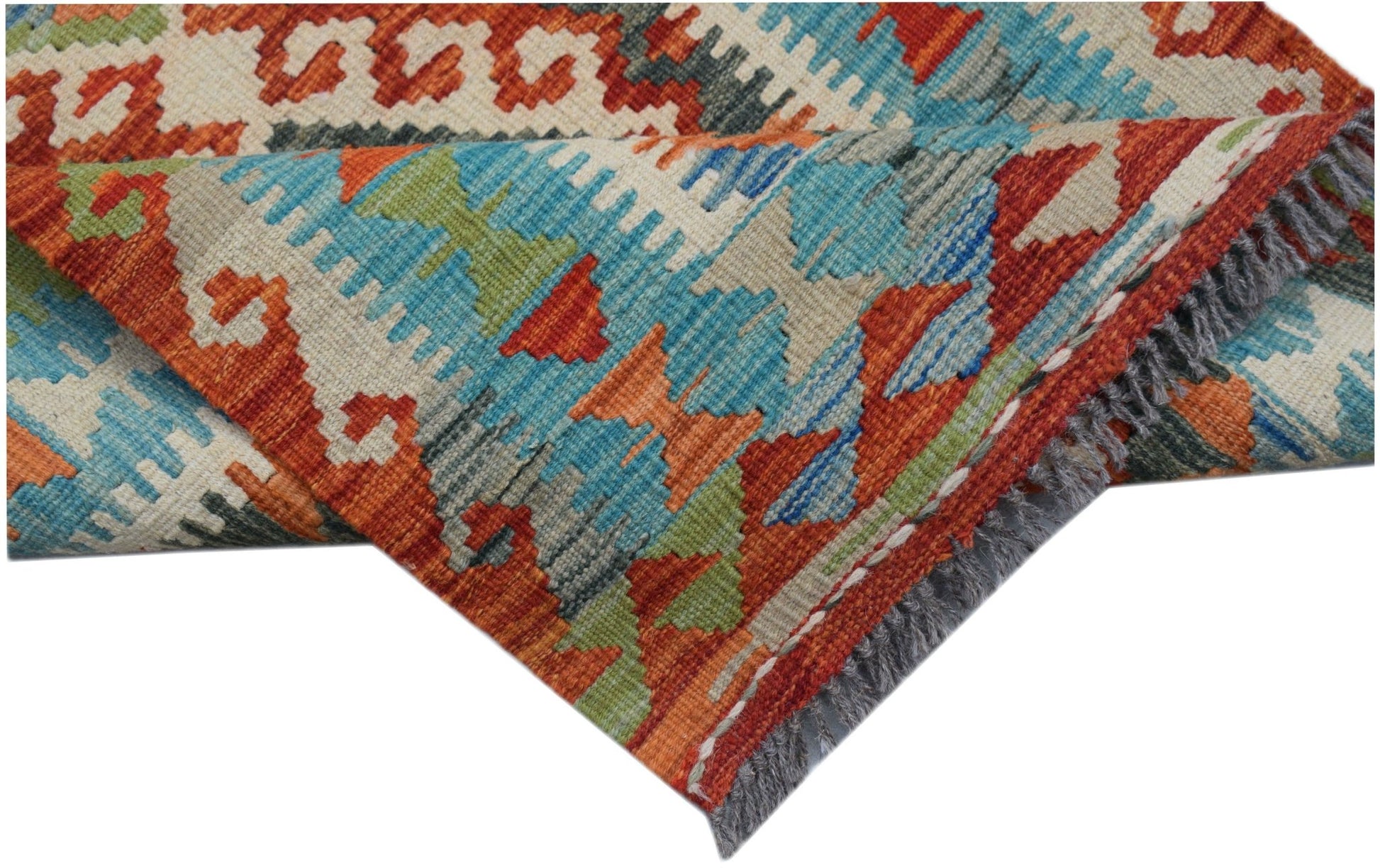 Handwoven Afghan Maimana wool kilim runner featuring a vibrant geometric pattern.
