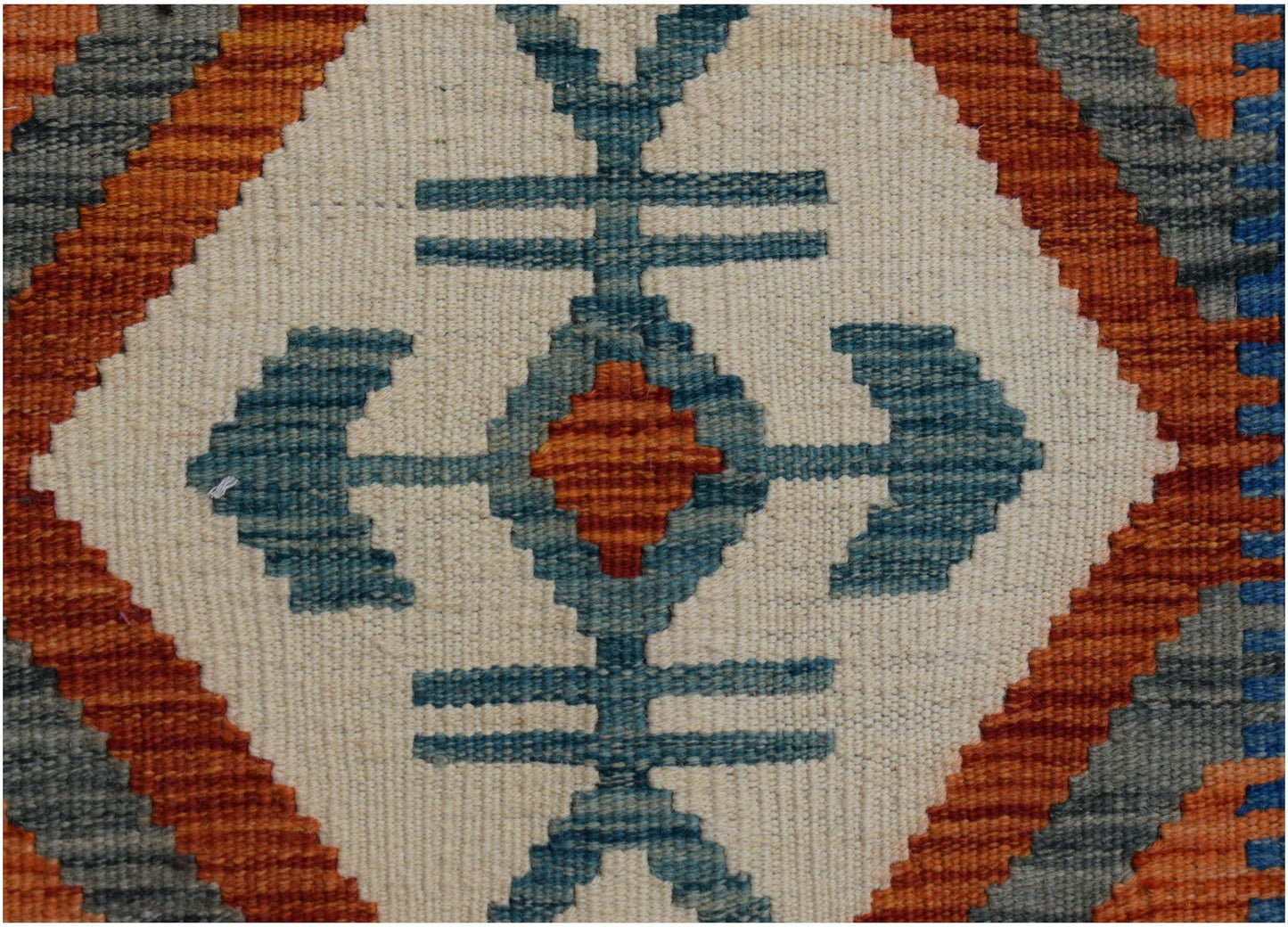 Handwoven Afghan Maimana kilim runner featuring a geometric blue and orange diamond pattern.