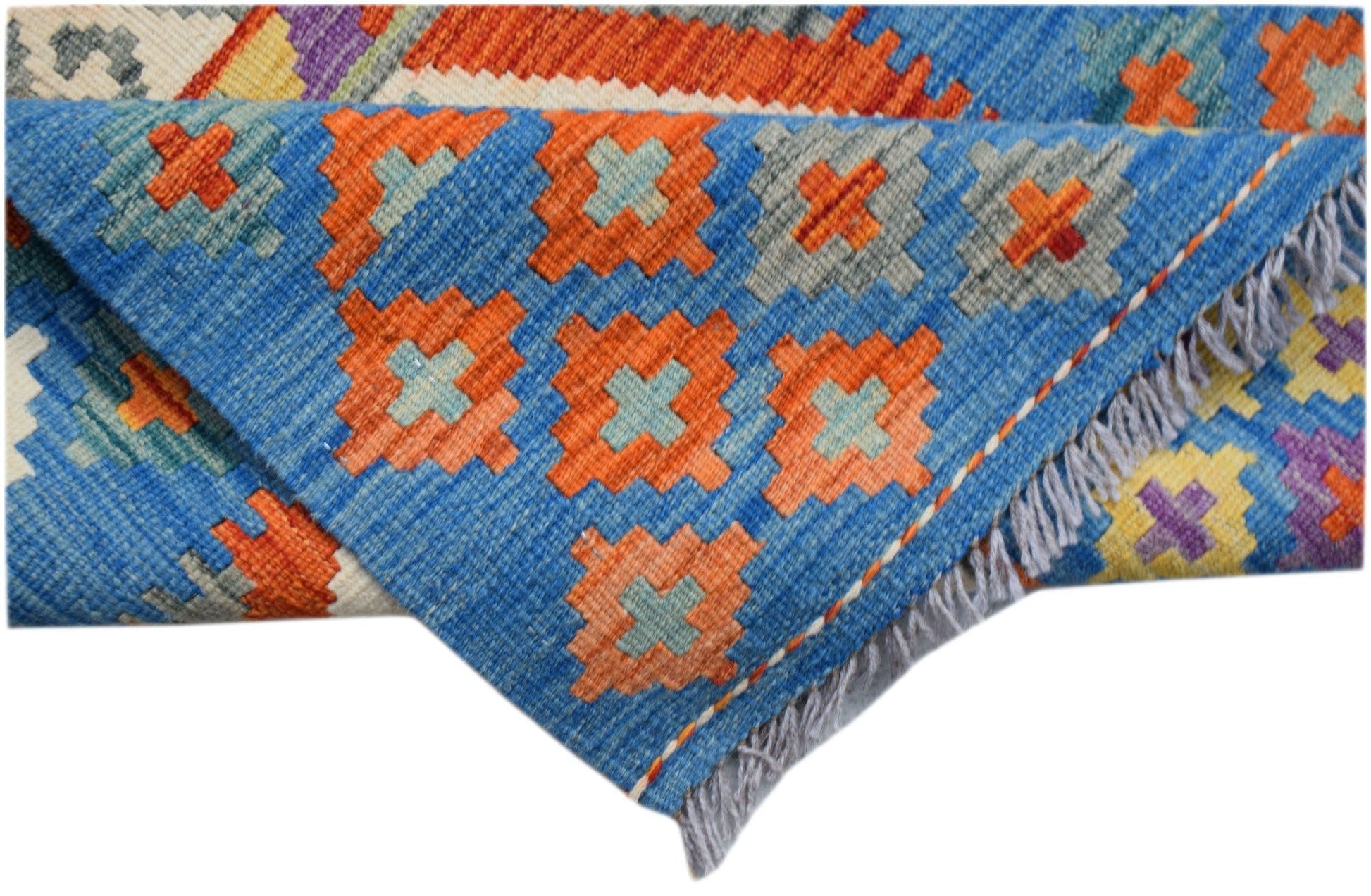 Handwoven Afghan Maimana Kilim runner featuring a blue background with geometric orange patterns.