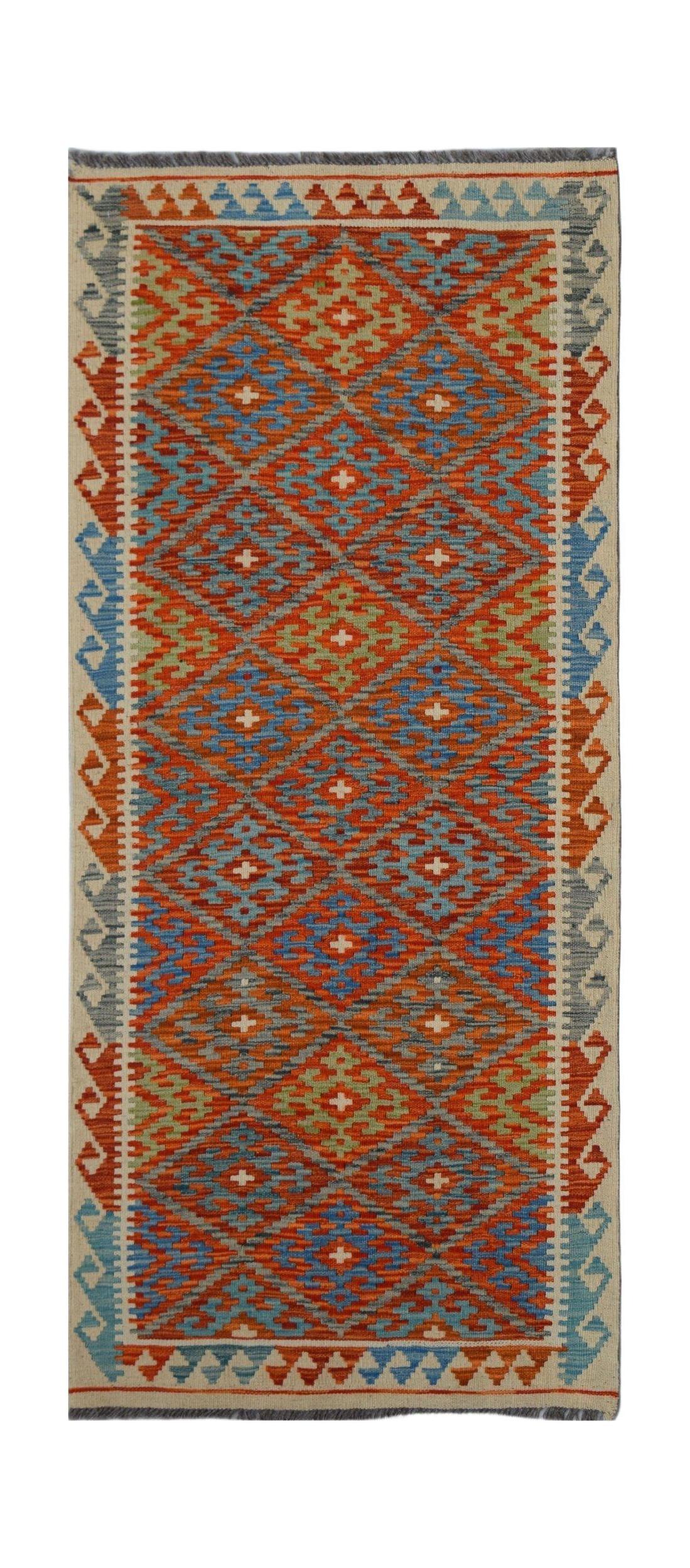 Handwoven Afghan Maimana wool runner featuring a geometric diamond pattern in vibrant colors.