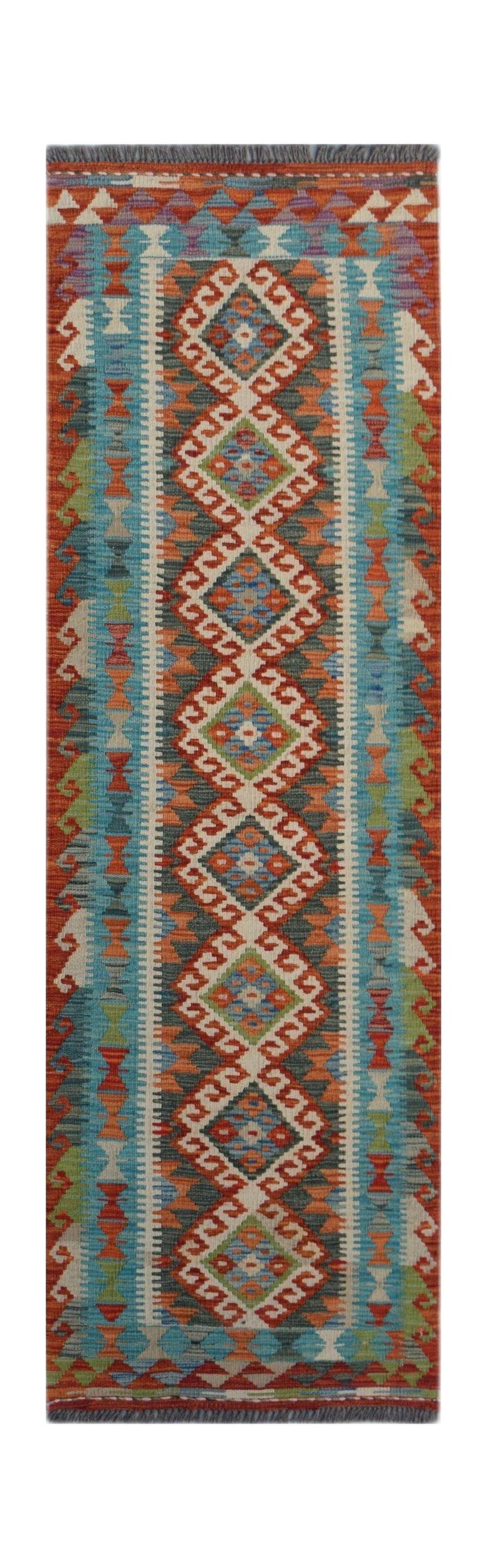 Handwoven Afghan Maimana wool runner rug featuring a colorful geometric diamond pattern.
