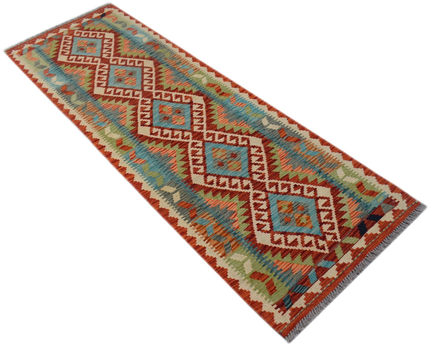 A handmade Afghan Maimana wool runner rug featuring a geometric diamond pattern in vibrant colors.