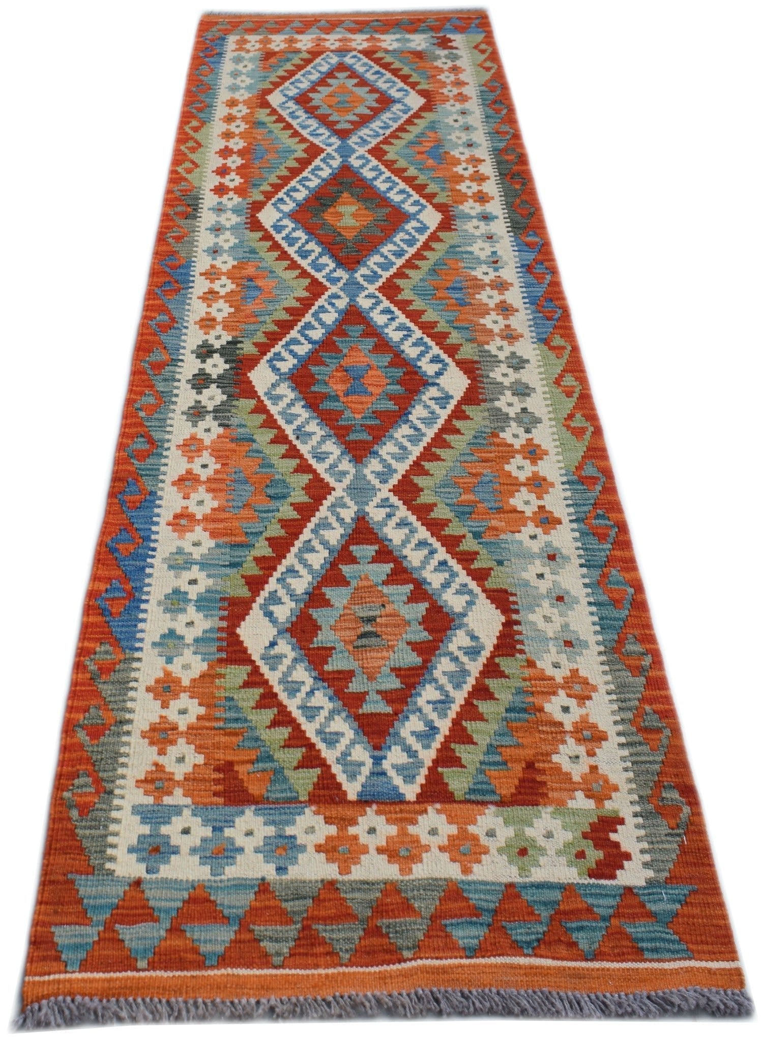 Handwoven Afghan Maimana wool runner rug featuring a geometric diamond pattern in vibrant colors.
