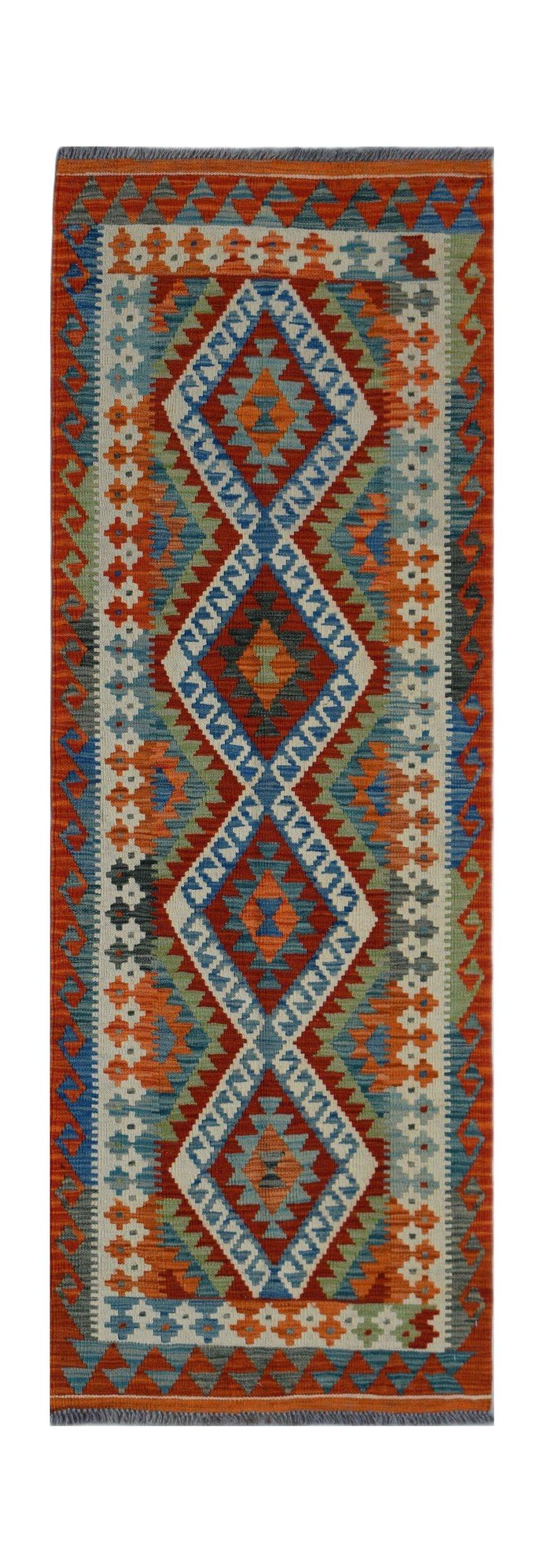 Handwoven Afghan Maimana wool runner featuring a vibrant geometric diamond pattern.