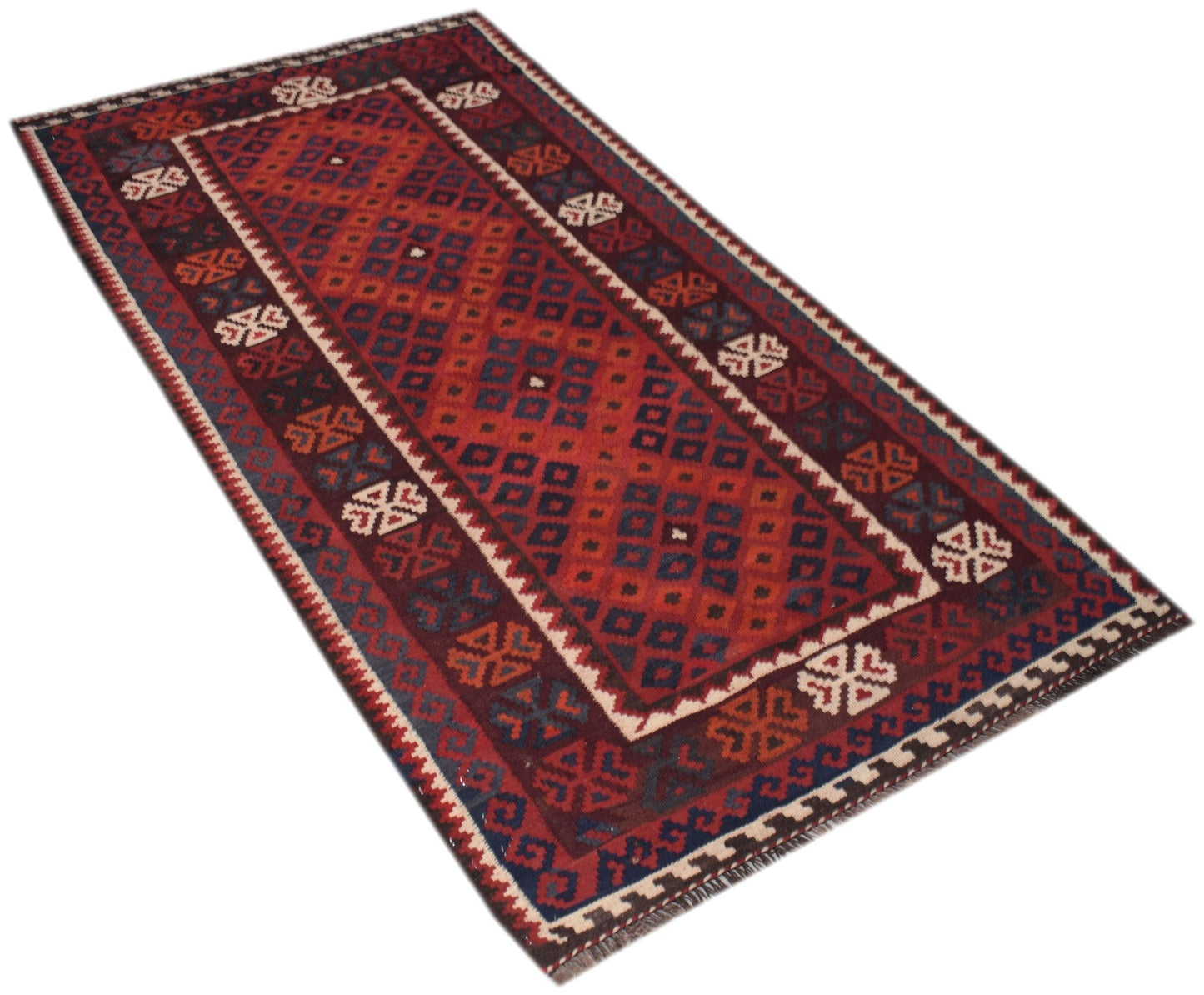 Handwoven Afghan Maimana wool runner rug featuring a geometric pattern in red and blue tones.