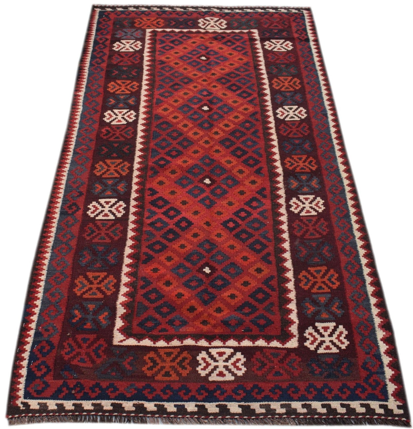 Handwoven Afghan Maimana wool runner rug featuring a geometric diamond pattern in red and blue.