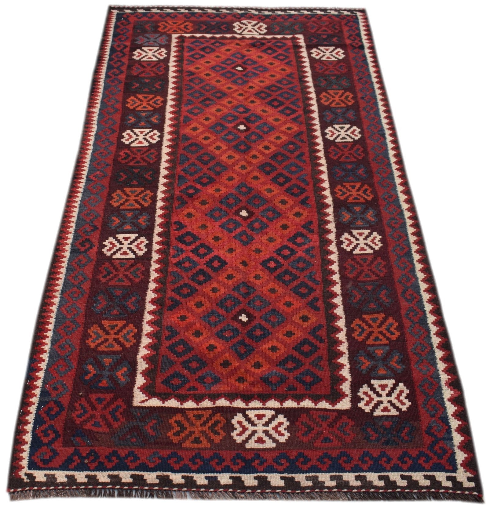 Handwoven Afghan Maimana wool runner rug featuring a geometric diamond pattern in red and blue.