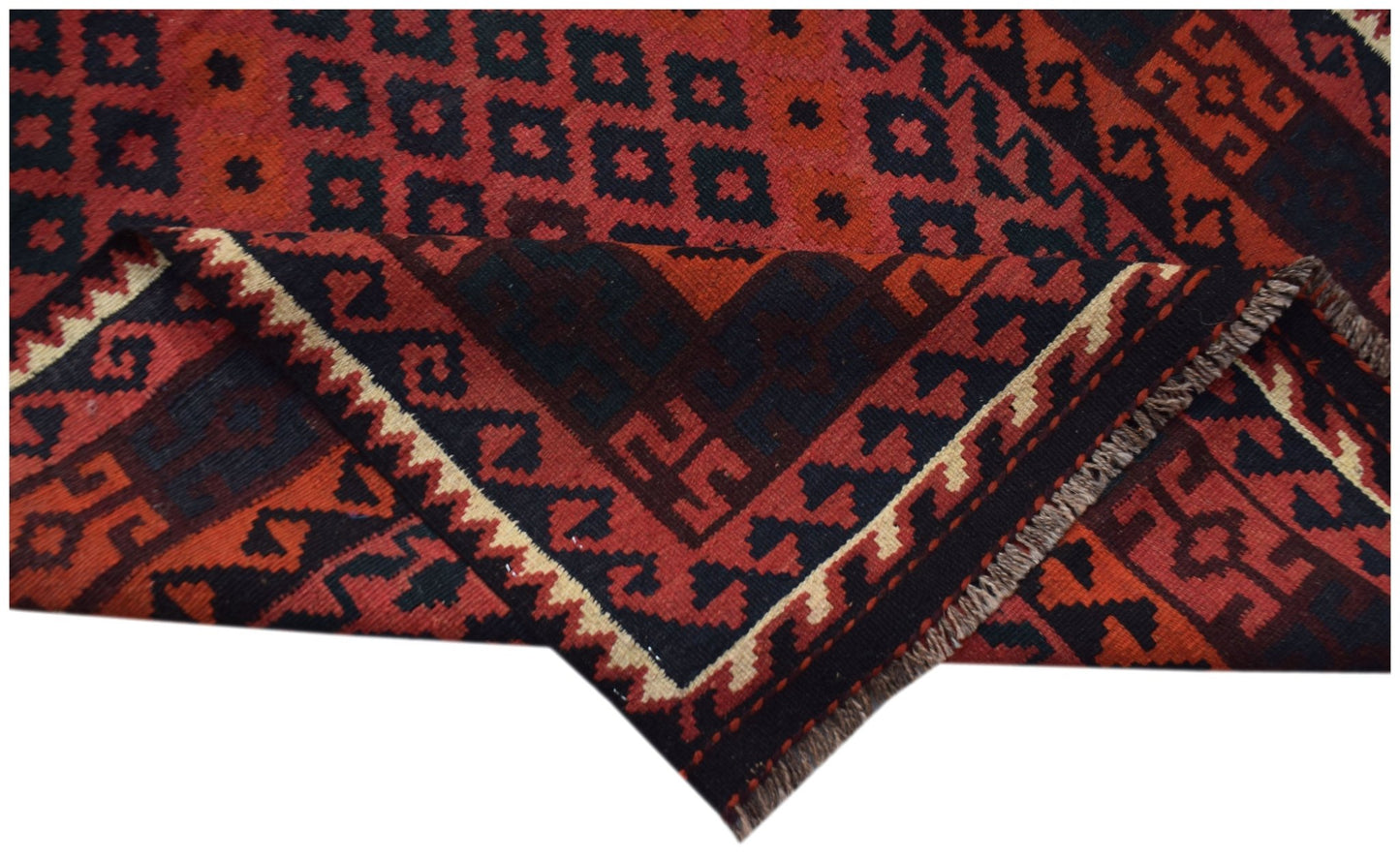 A handmade Afghan Maimana kilim runner featuring a geometric pattern in red and black wool.
