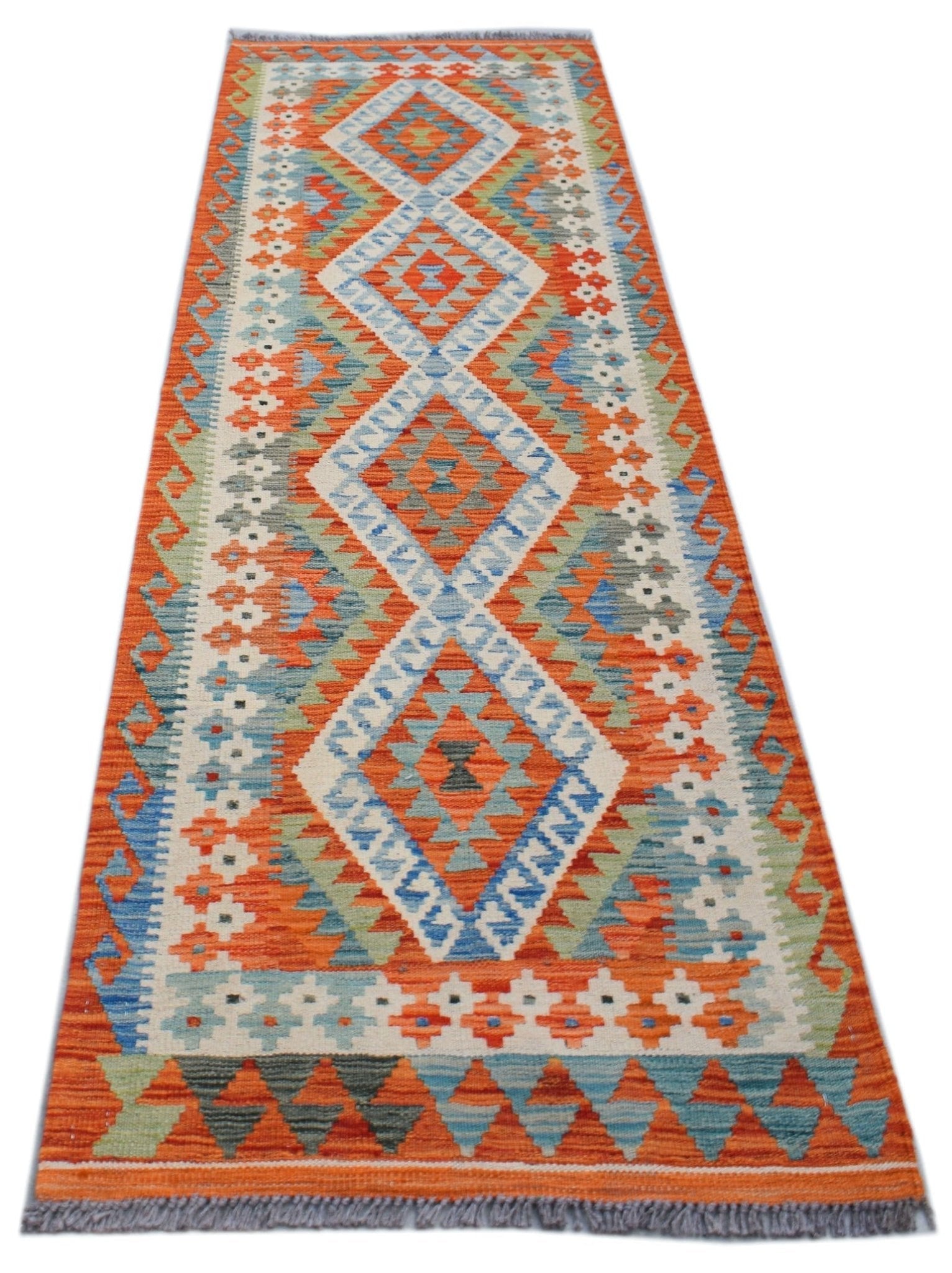 Handwoven Afghan Maimana wool runner rug featuring a geometric diamond pattern in orange and blue.