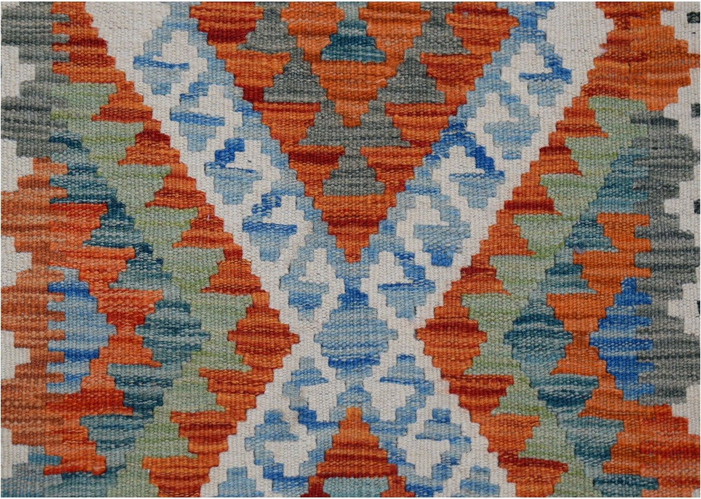 Handwoven Afghan Maimana kilim runner featuring a geometric pattern in orange, blue, and grey.