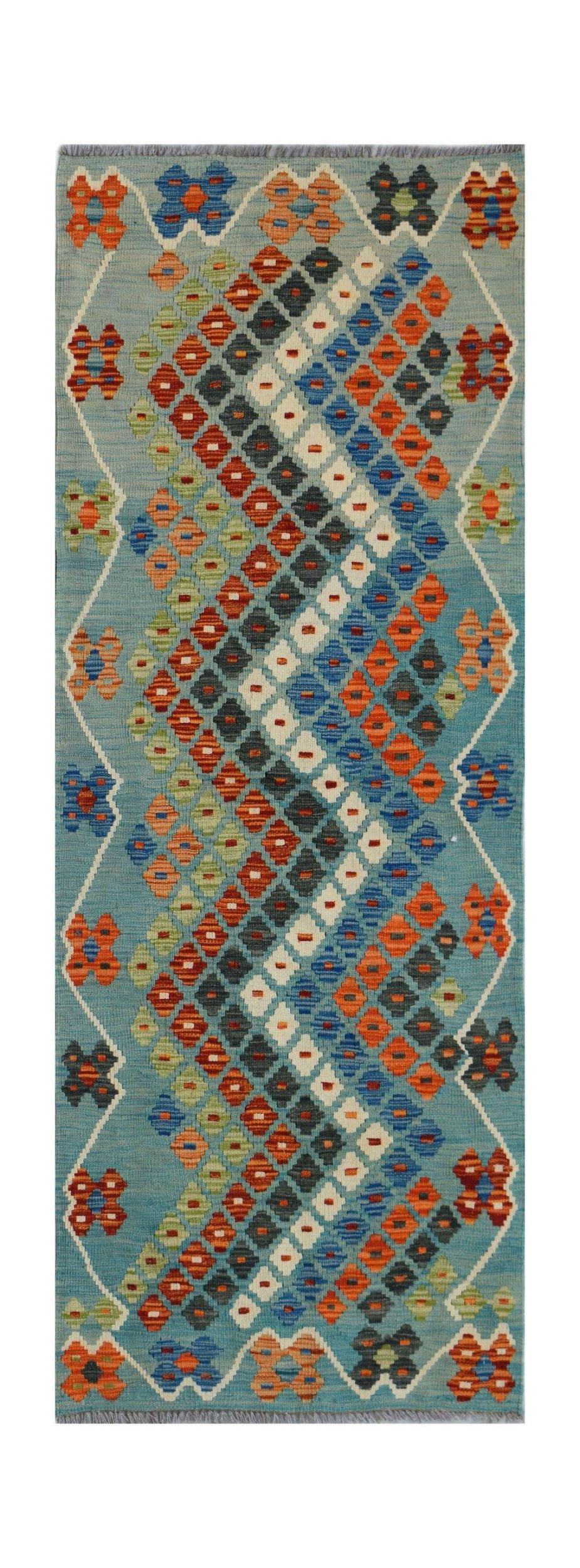 Handwoven Afghan Maimana wool runner featuring a geometric diamond pattern in blue and orange.