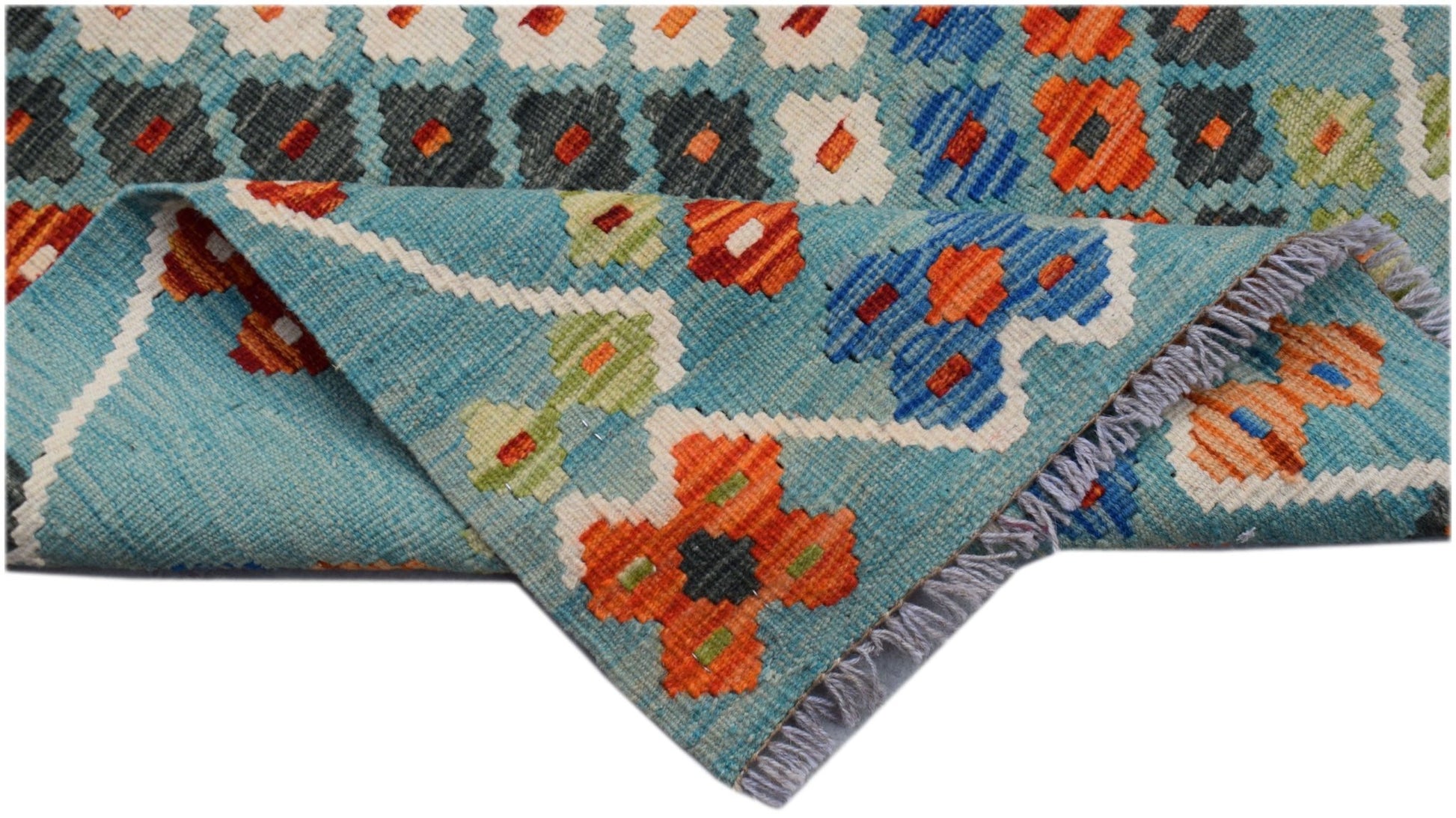 Handwoven Afghan Maimana kilim runner featuring a geometric floral pattern in blue and orange.